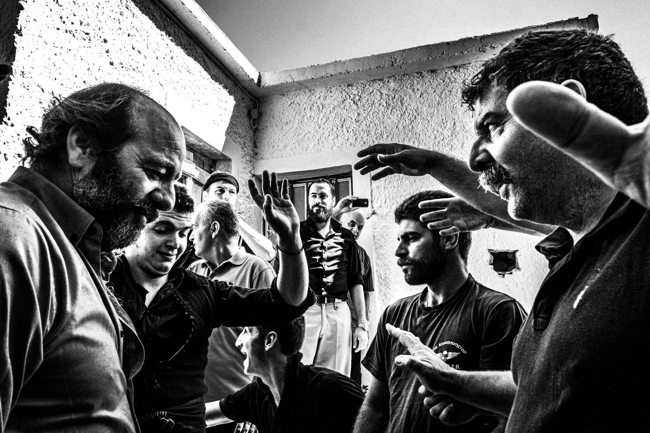 The 'fight' at the bride's house, Anogia, Rethymnon, Crete, by photographer George Tatakis