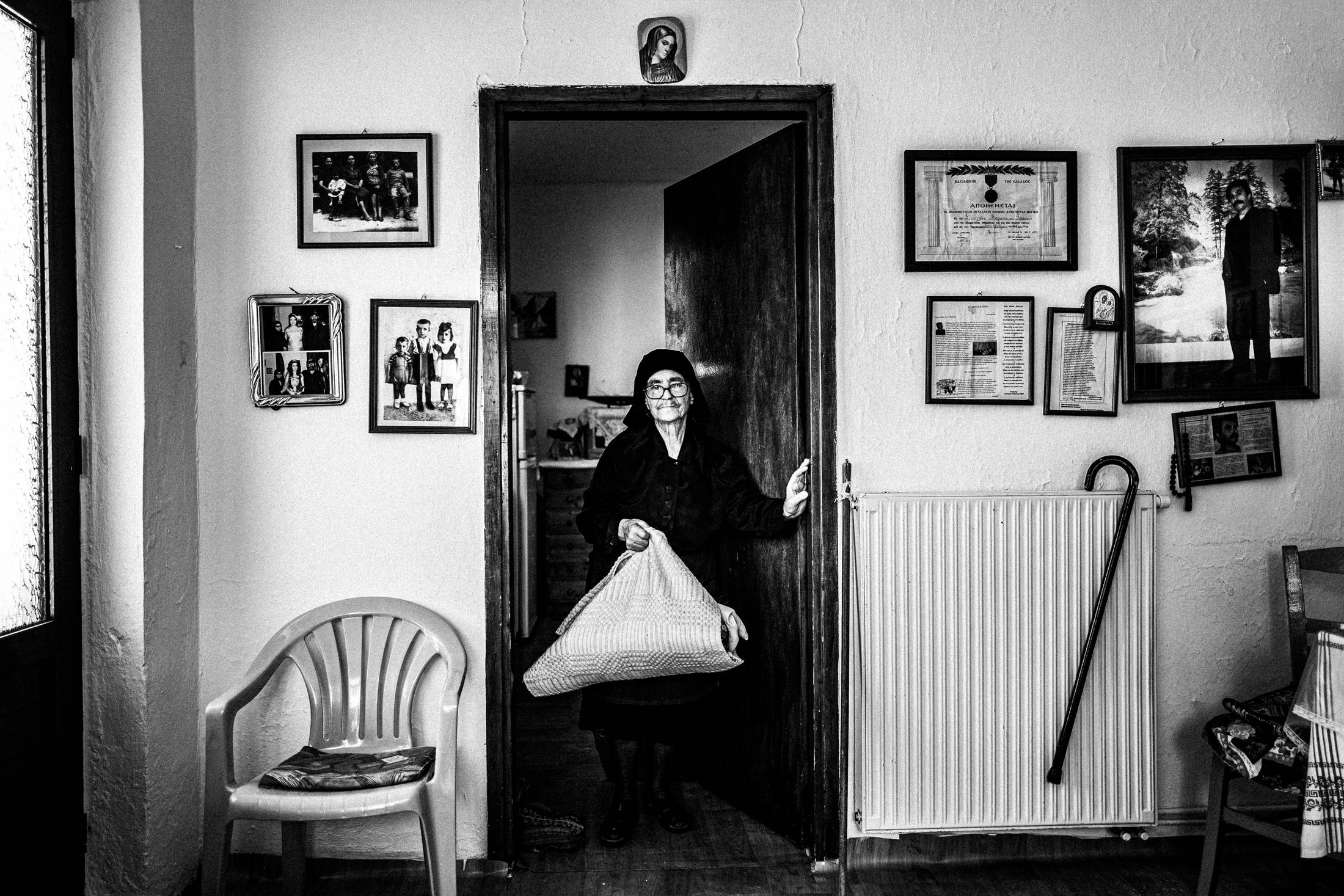 Gianna inside her shop in Anogia, Rethymnon, Crete, by photographer George Tatakis