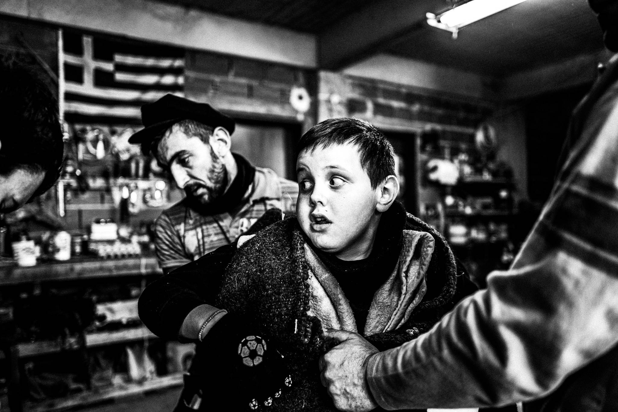 Children can't wait to get out in the streets of Volax, Pagan Christmas customs of Northern Greece, by photographer George Tatakis