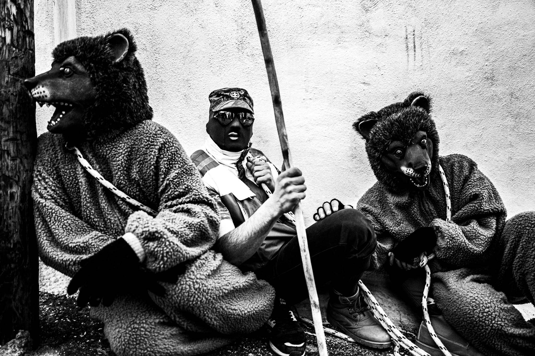 Bear handler and bears, Pagan Christmas customs of Northern Greece, by photographer George Tatakis
