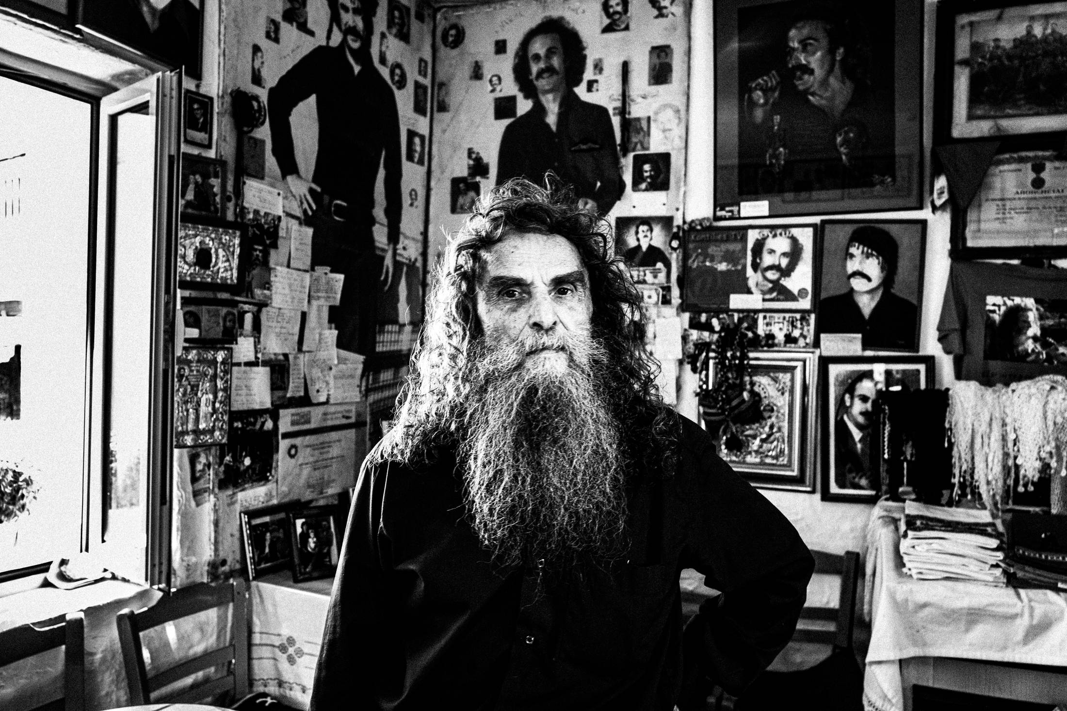 Psarantonis inside his brother's house in Anogia, Rethymnon, Crete, by photographer George Tatakis