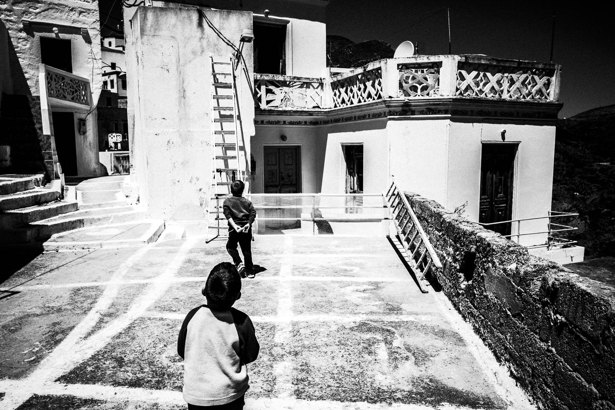 Children playing around the village of Olympos, on the island of Karpathos, Greece