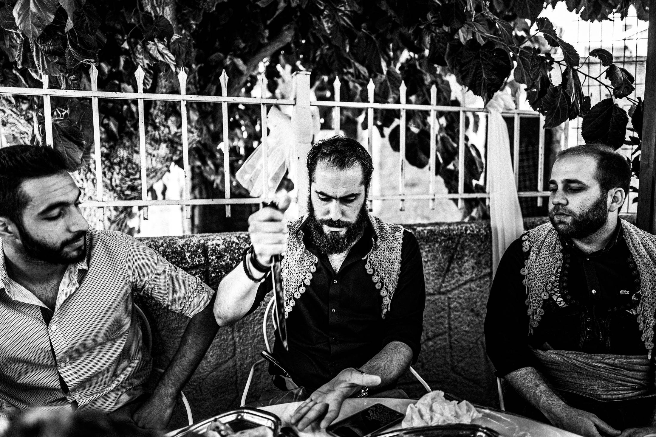 Family and friends before the wedding, Anogia, Rethymnon, Crete, by photographer George Tatakis