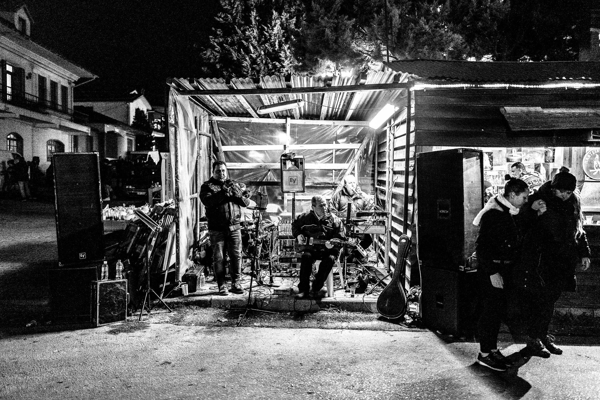 A band playing music, Pagan Christmas customs of Northern Greece, by photographer George Tatakis