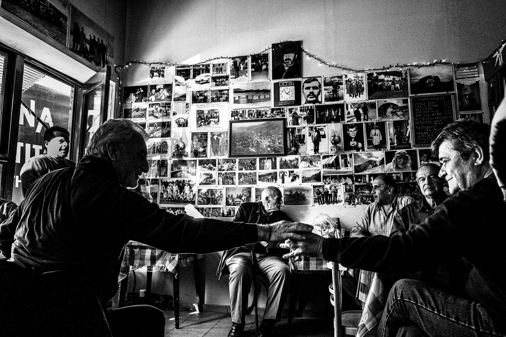Café in Florina, Pagan Christmas customs of Northern Greece, by photographer George Tatakis