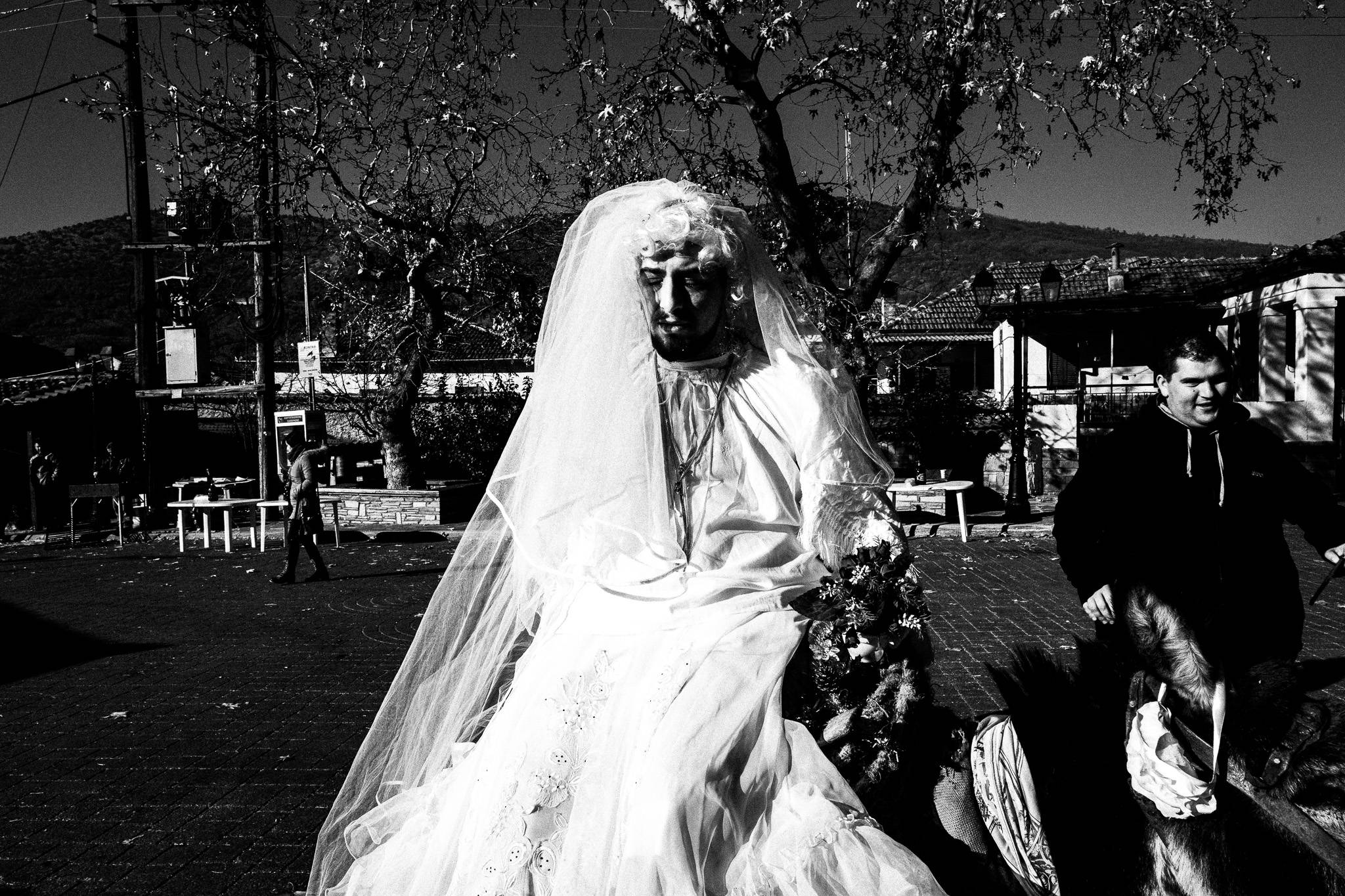 The bride arrive at the main square of Germas village, Pagan Christmas customs of Northern Greece, by photographer George Tatakis
