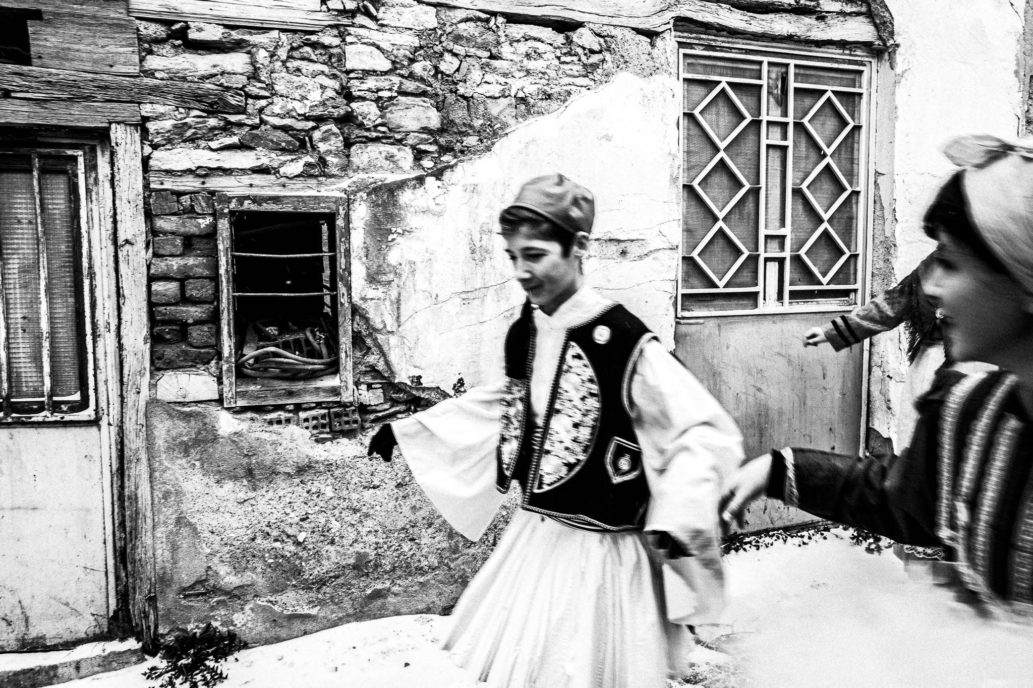 The couple round the village, Pagan Christmas customs of Northern Greece, by photographer George Tatakis