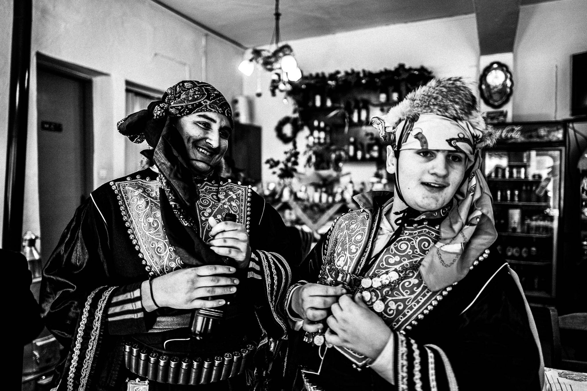 Inside the café, Pagan Christmas customs of Northern Greece, by photographer George Tatakis
