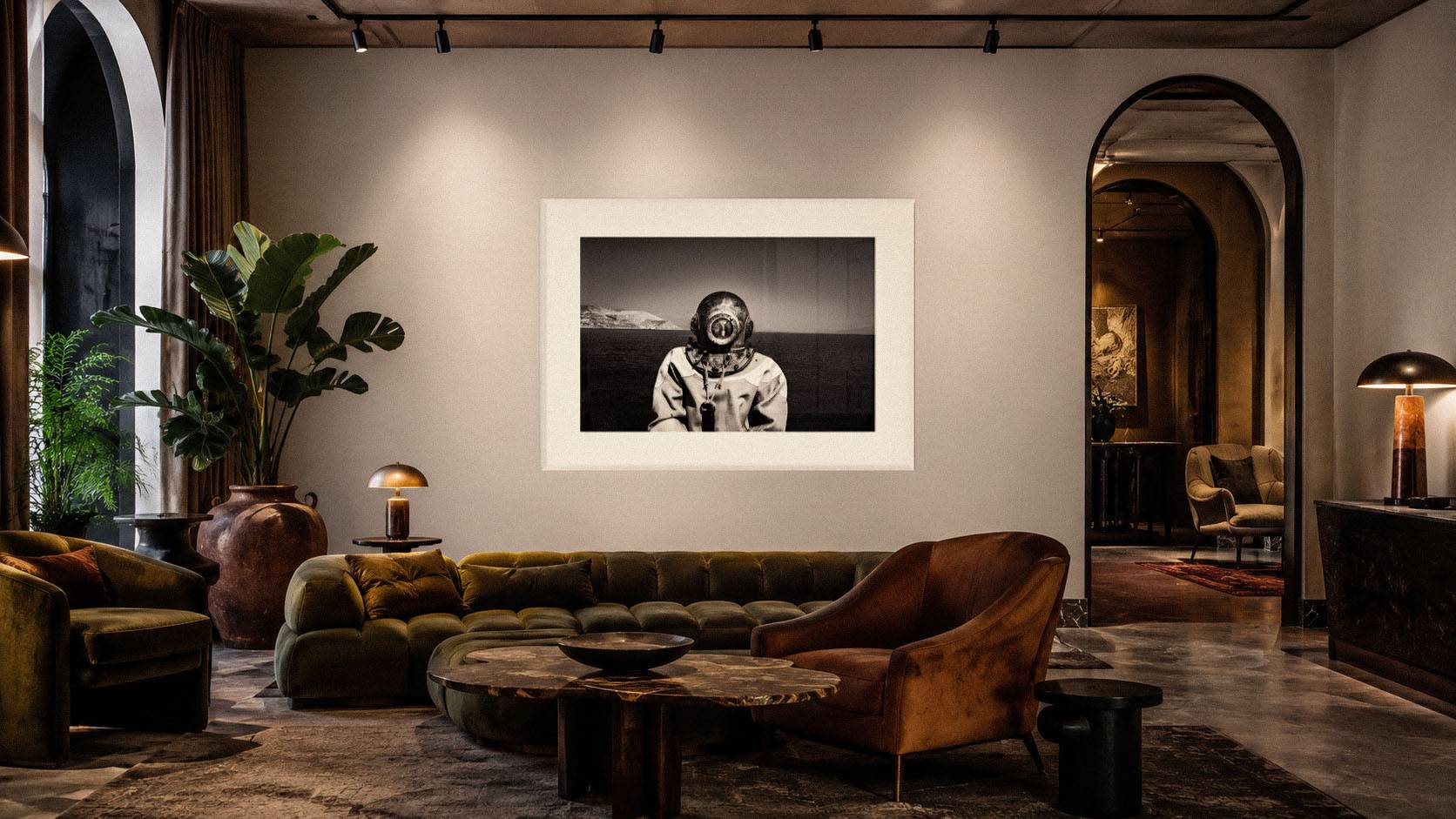 Black-and-white fine-art photograph displayed in a luxurious contemporary interior, illustrating how monochrome photography integrates naturally into sophisticated architectural spaces.