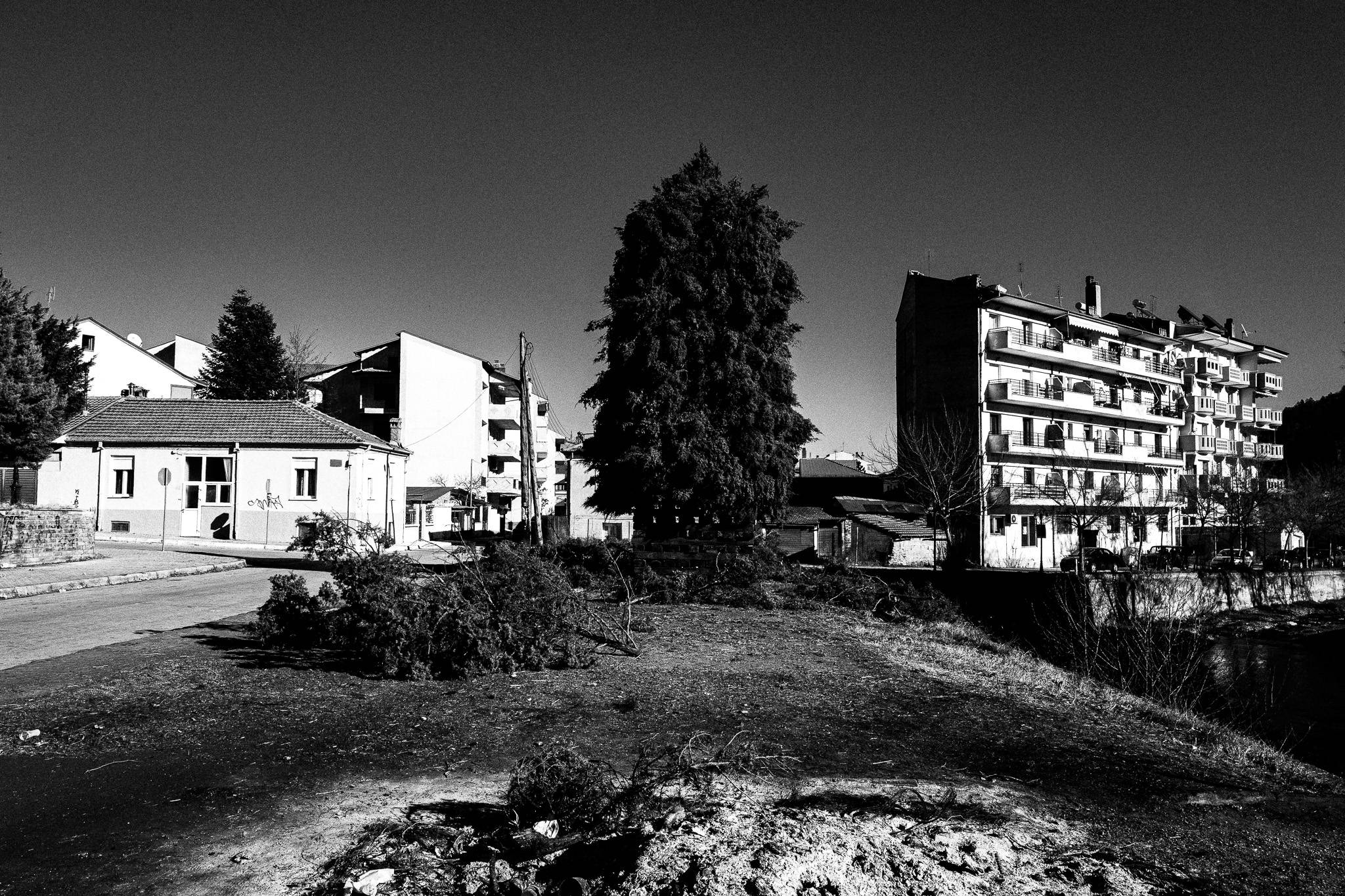 A pile of woods at Florina, Pagan Christmas customs of Northern Greece, by photographer George Tatakis