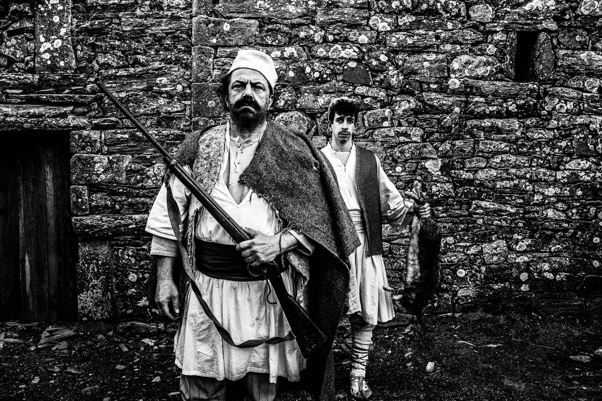Portrait of 'Kabanachmakis' and his son. Black and white photography by George Tatakis during the filming of 'Φόνισσα'(Fonissa).