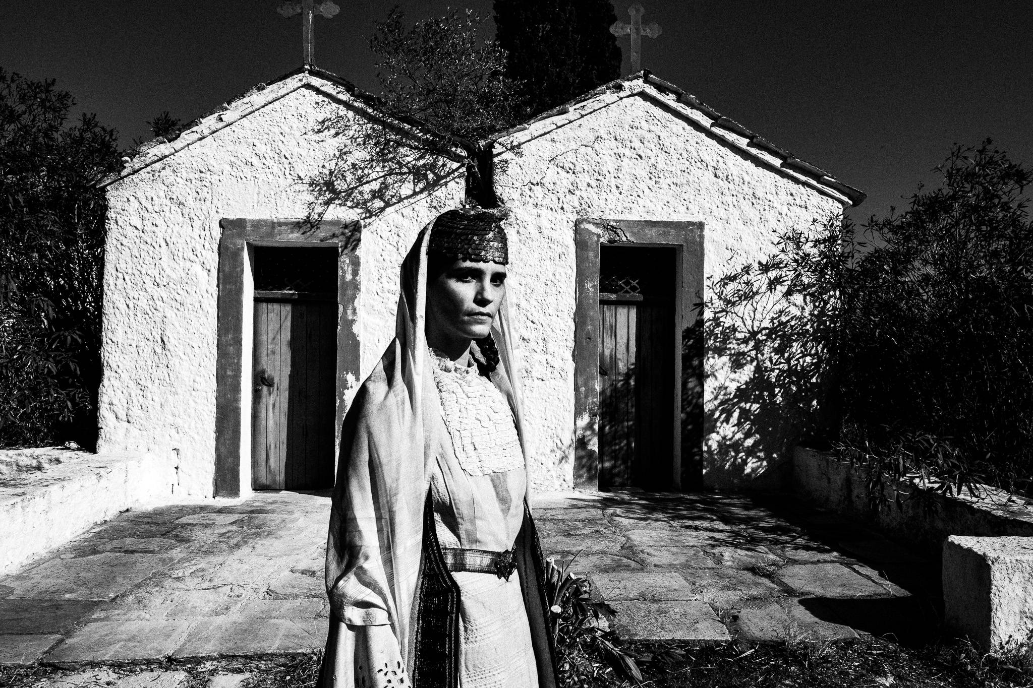 Bride at the church. Black and white photography by George Tatakis during the filming of 'Φόνισσα'(Fonissa).