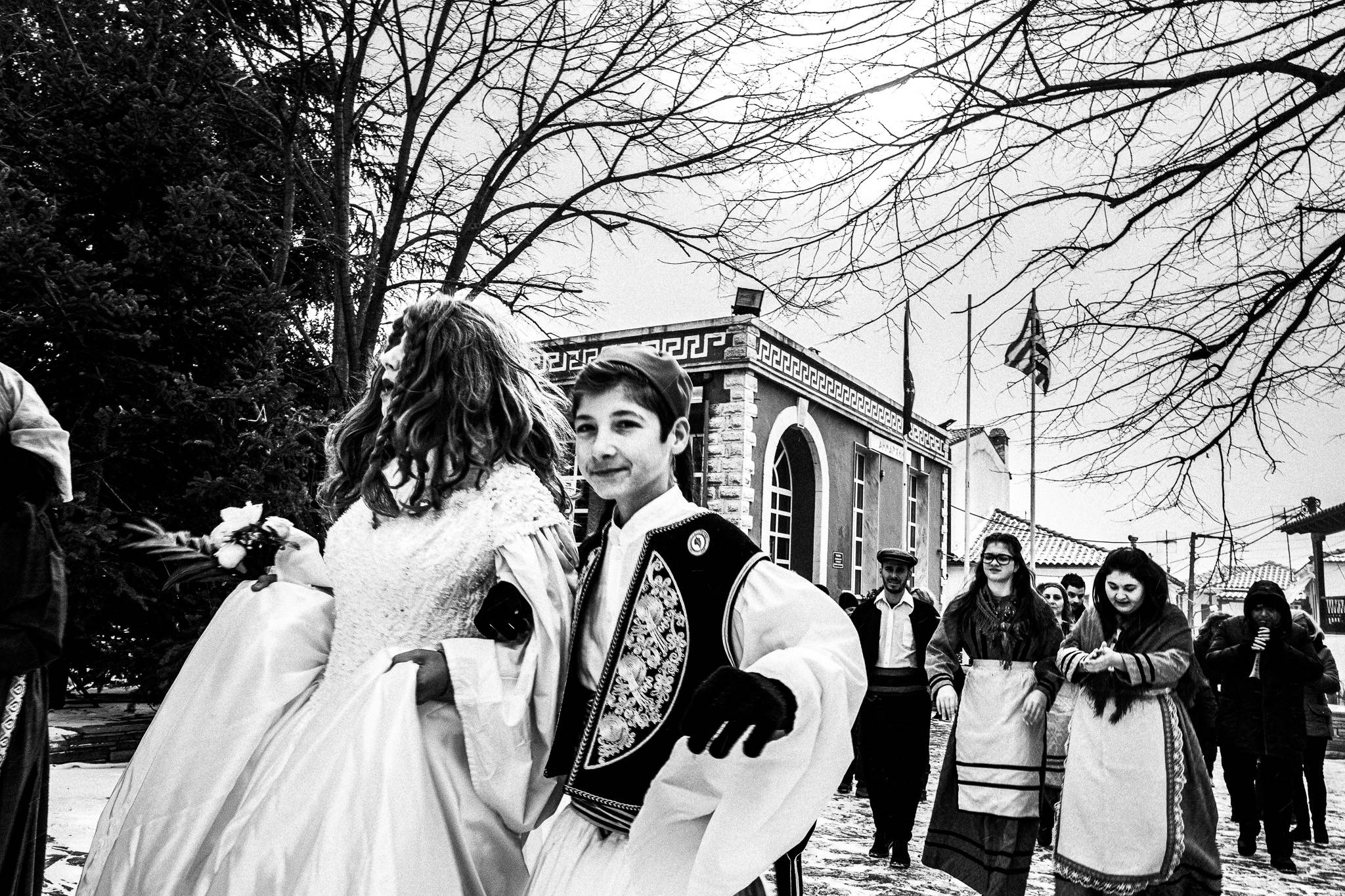 The couple at the village, Pagan Christmas customs of Northern Greece, by photographer George Tatakis