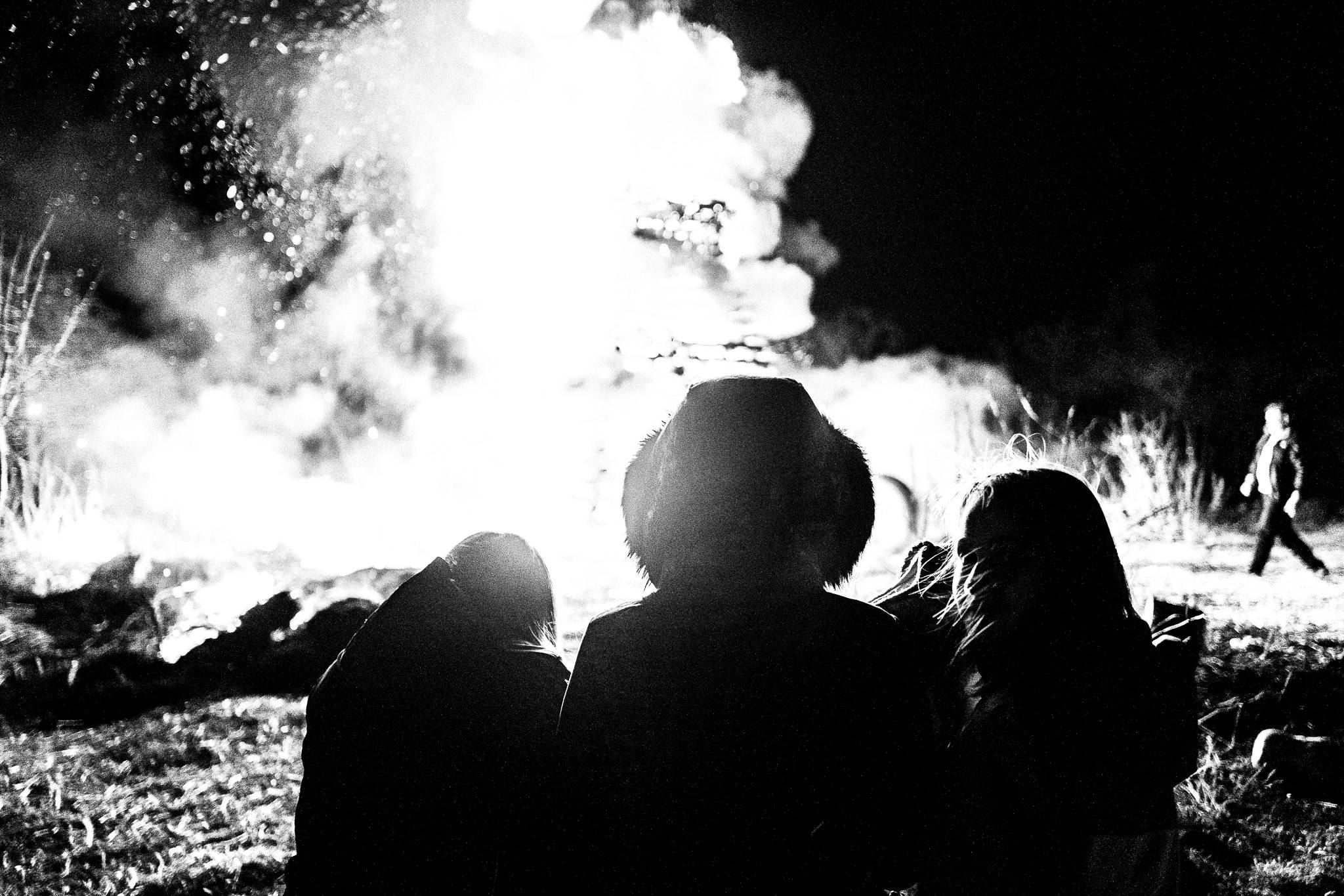 People gather round the bonfire, Pagan Christmas customs of Northern Greece, by photographer George Tatakis