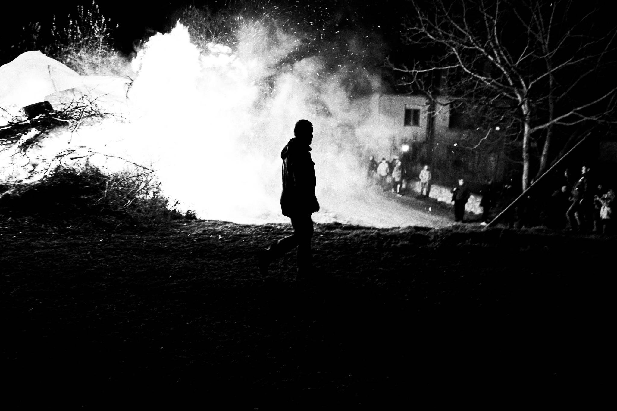Warming up by the fire, Pagan Christmas customs of Northern Greece, by photographer George Tatakis