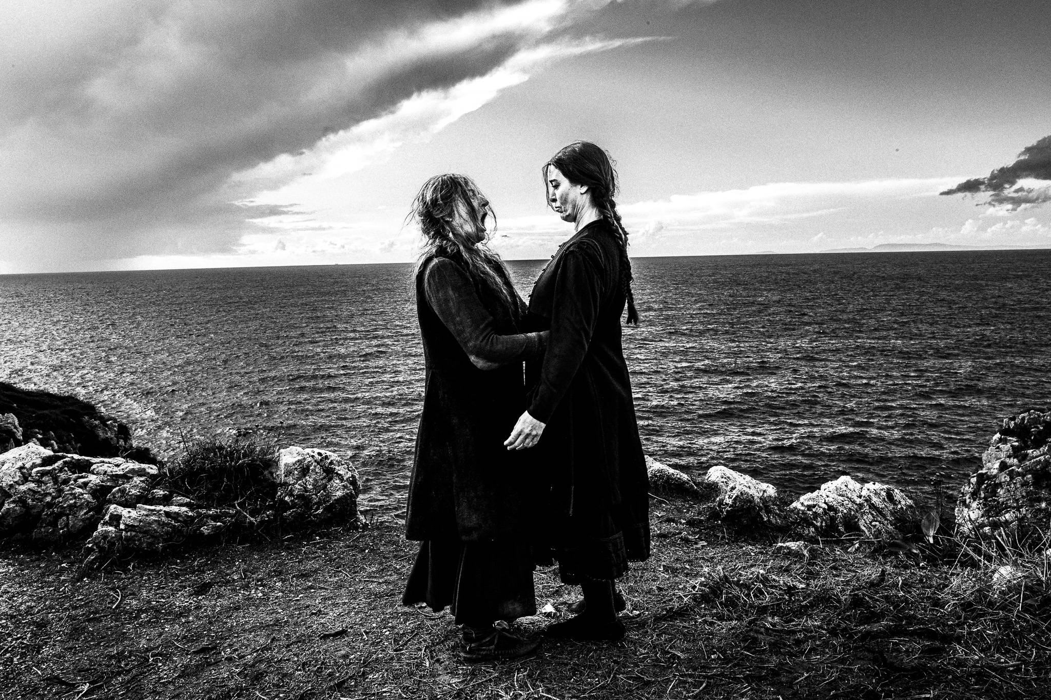 Filming the last scene. Karyofillia Karabetis and Maria Protopappas. Black and white photography by George Tatakis during the filming of 'Φόνισσα'(Fonissa).
