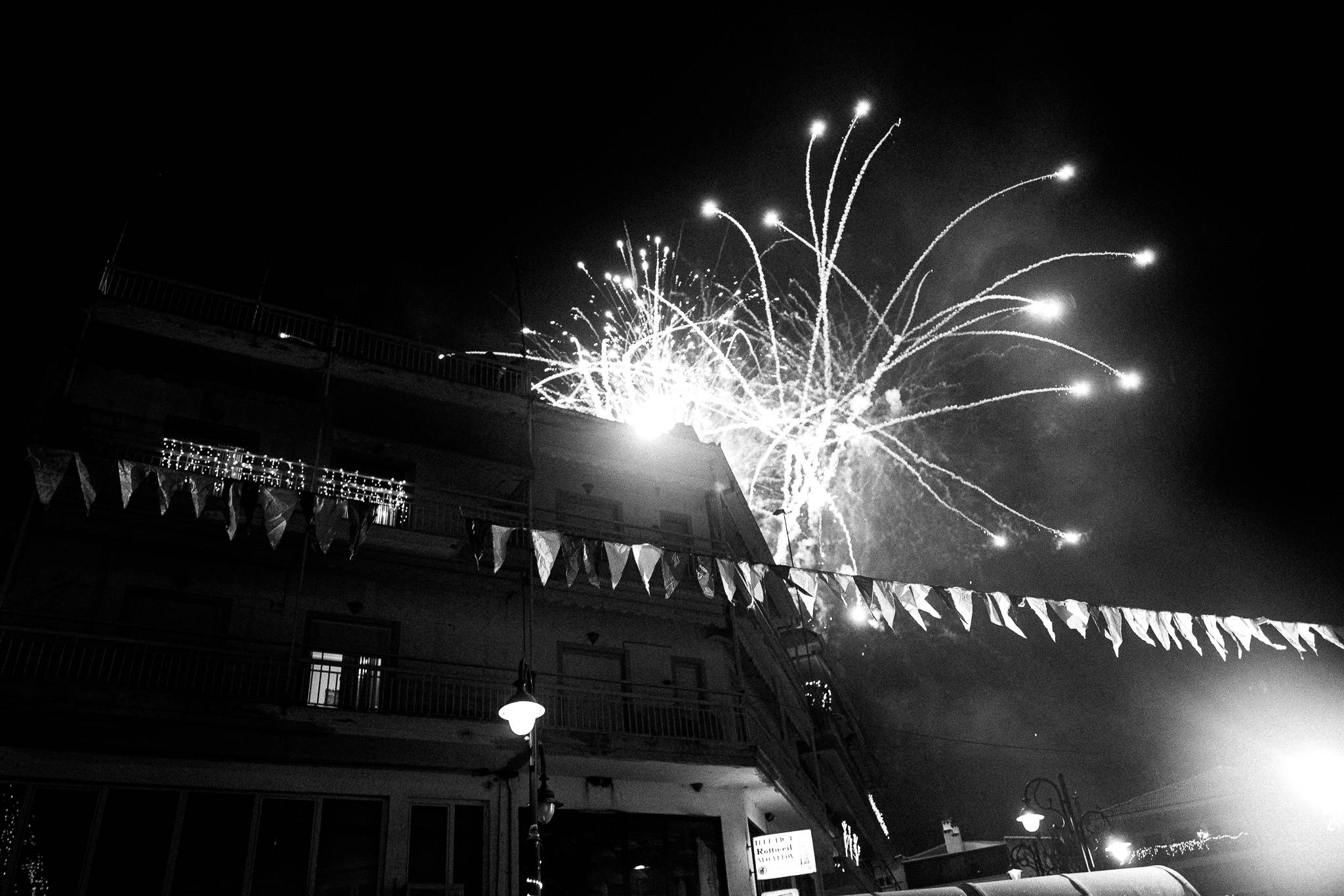 Fireworks go off at midnight to welcome the New Year, Pagan Christmas customs of Northern Greece, by photographer George Tatakis