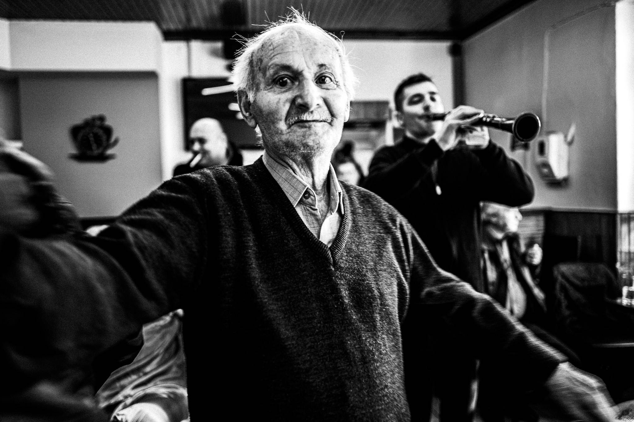 An old man at the café, Pagan Christmas customs of Northern Greece, by photographer George Tatakis