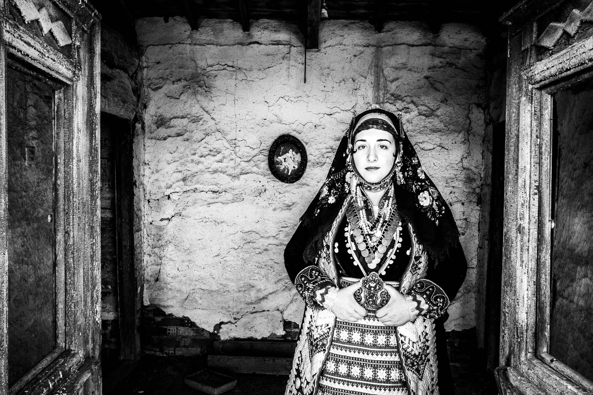 Makra Gefyra costume, Pagan Christmas customs of Northern Greece, by photographer George Tatakis