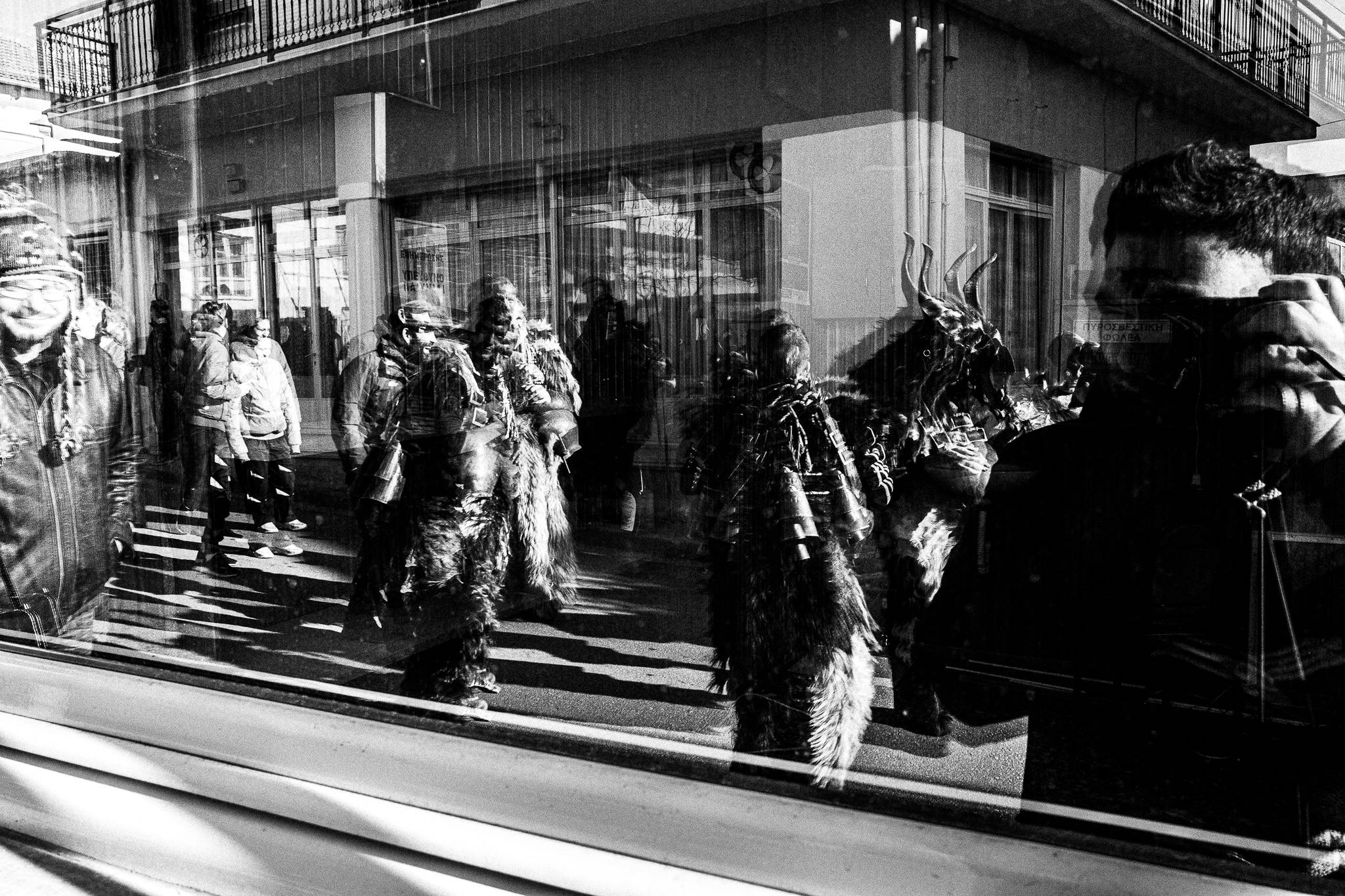 The procession through glass, Pagan Christmas customs of Northern Greece, by photographer George Tatakis