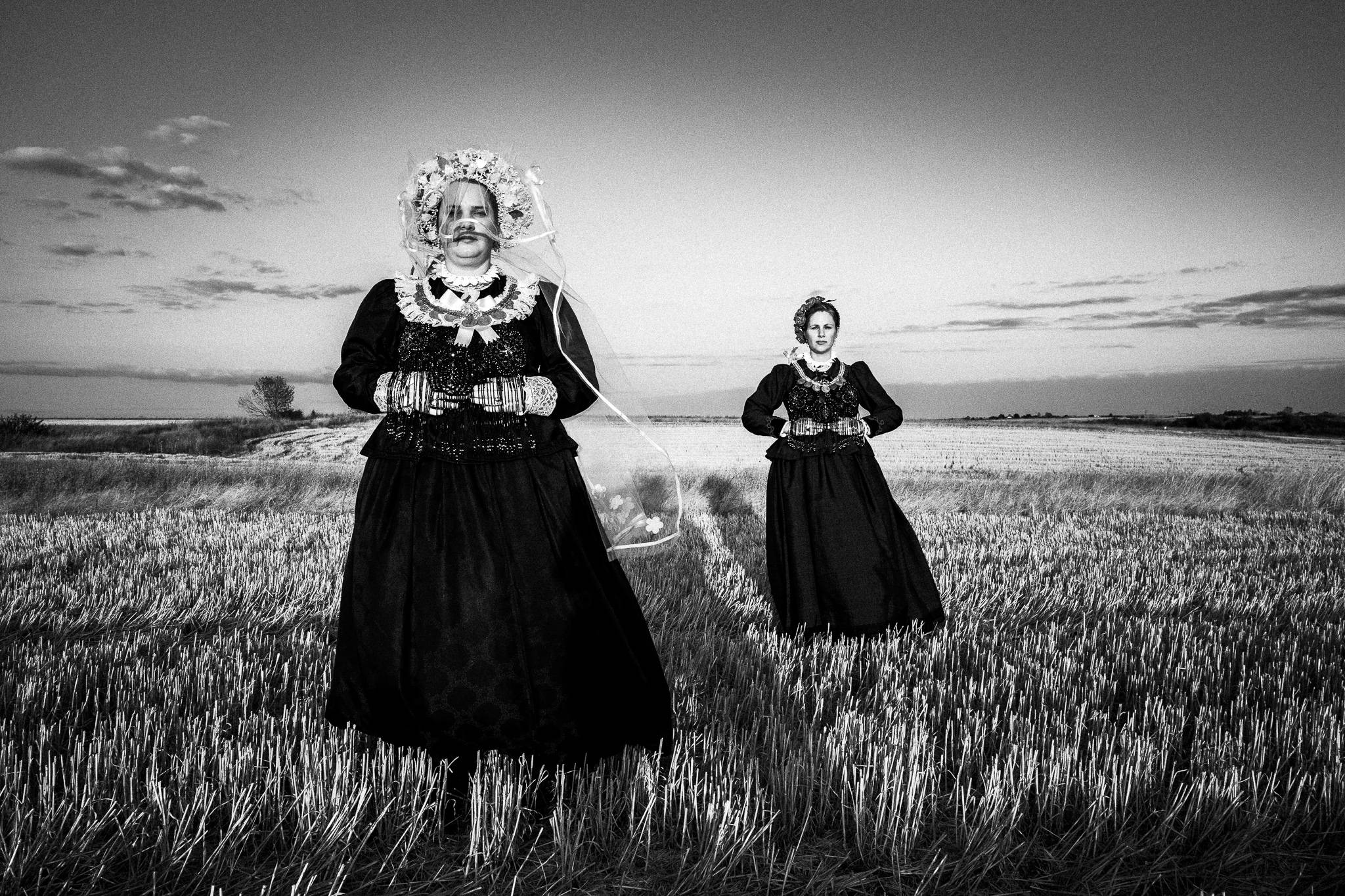 Sisters amongst the crops in Nea Vyssa, Evros, Thrace, Greece, by photographer George Tatakis