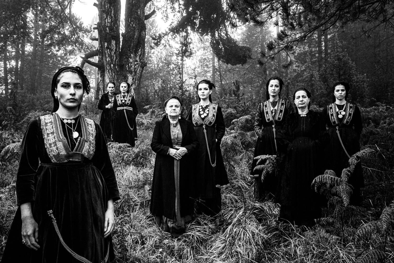 A group of women wearing the local Vlach dresses on Seli Mountain, Imathia, Macedonia, Greece. Black and white photograph by George Tatakis