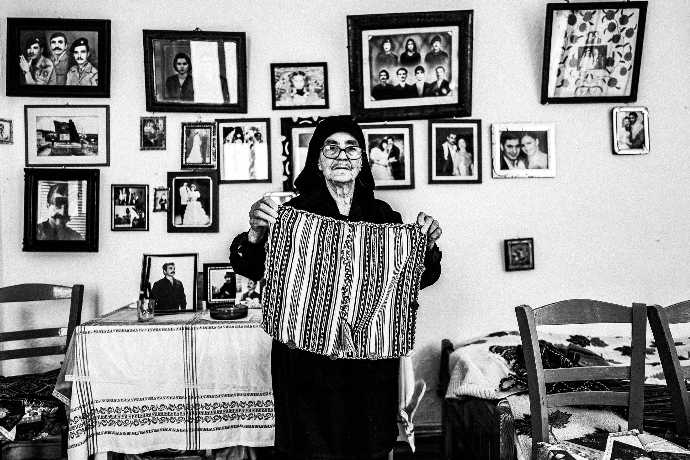 Gianna inside her shop in Anogia, Rethymnon, Crete, by photographer George Tatakis