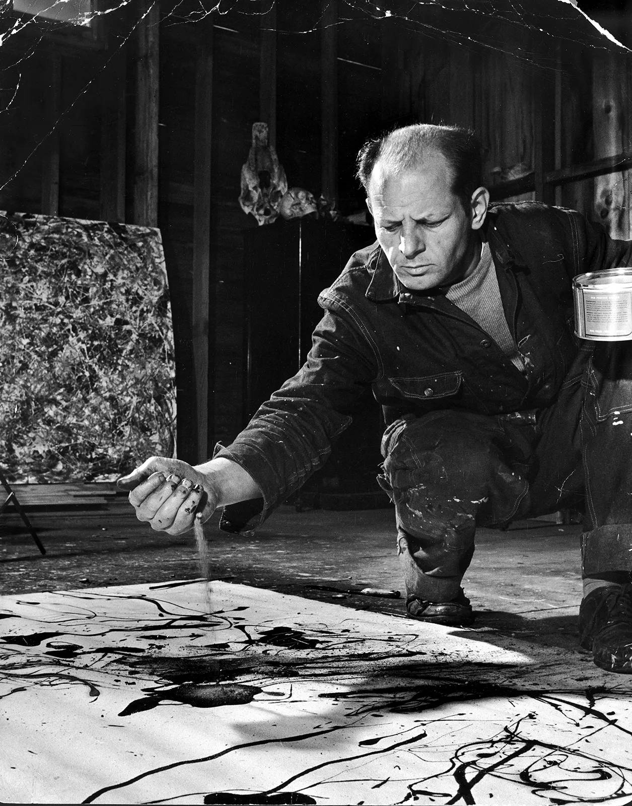 Jackson Pollock working in his studio in East Hampton, New York.