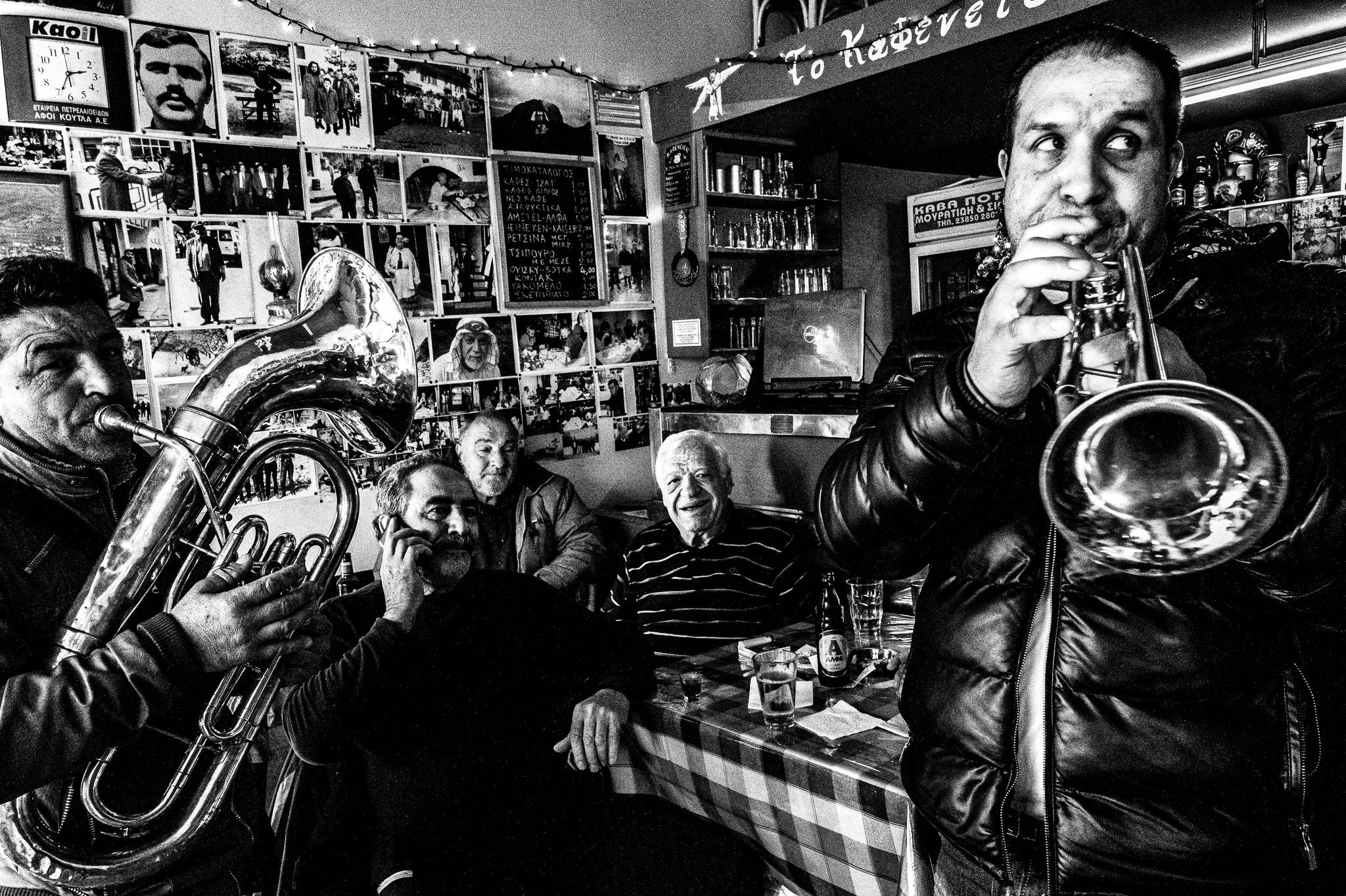 Music in the café, Pagan Christmas customs of Northern Greece, by photographer George Tatakis