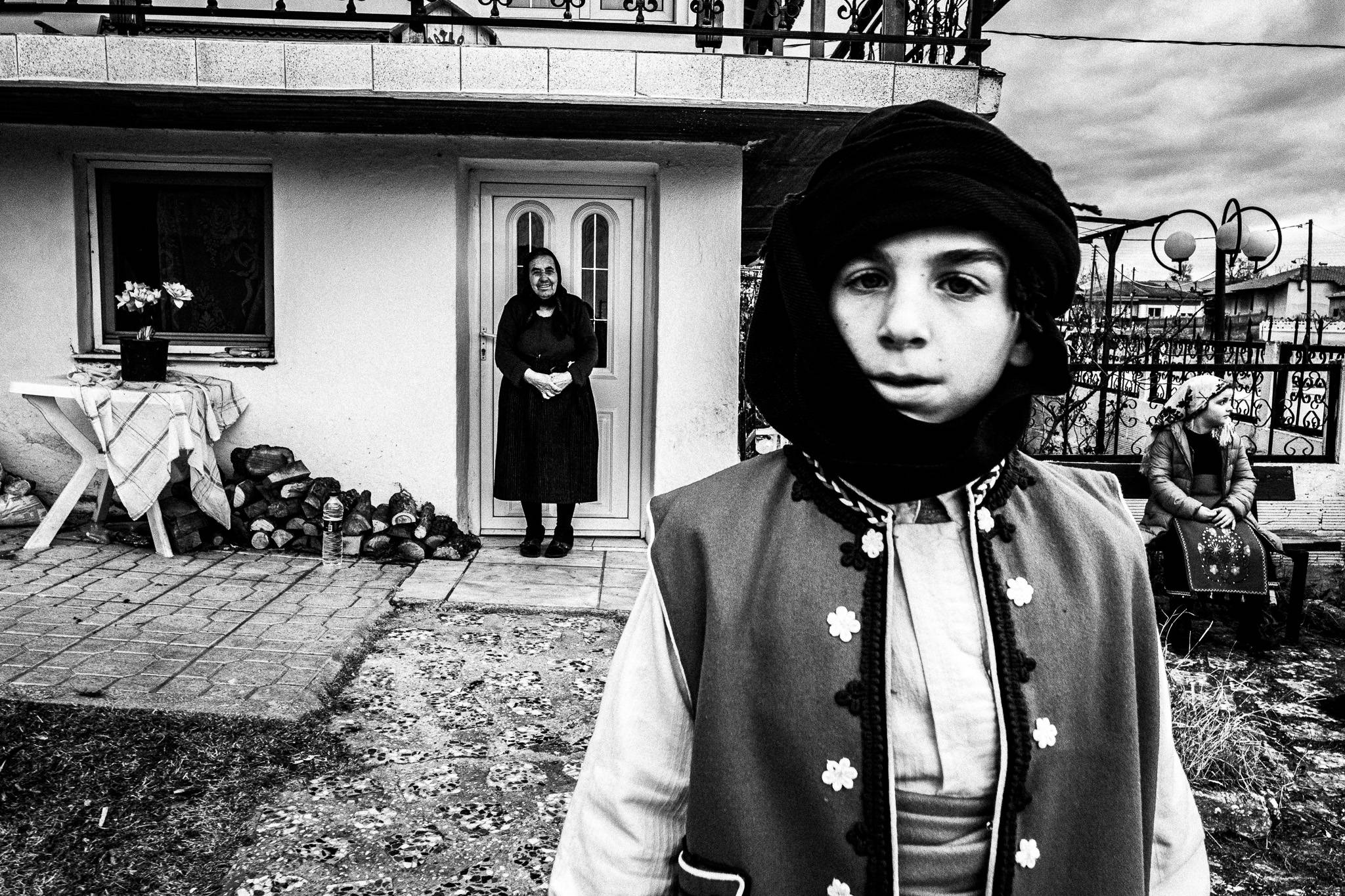 Visiting local houses, Pagan Christmas customs of Northern Greece, by photographer George Tatakis