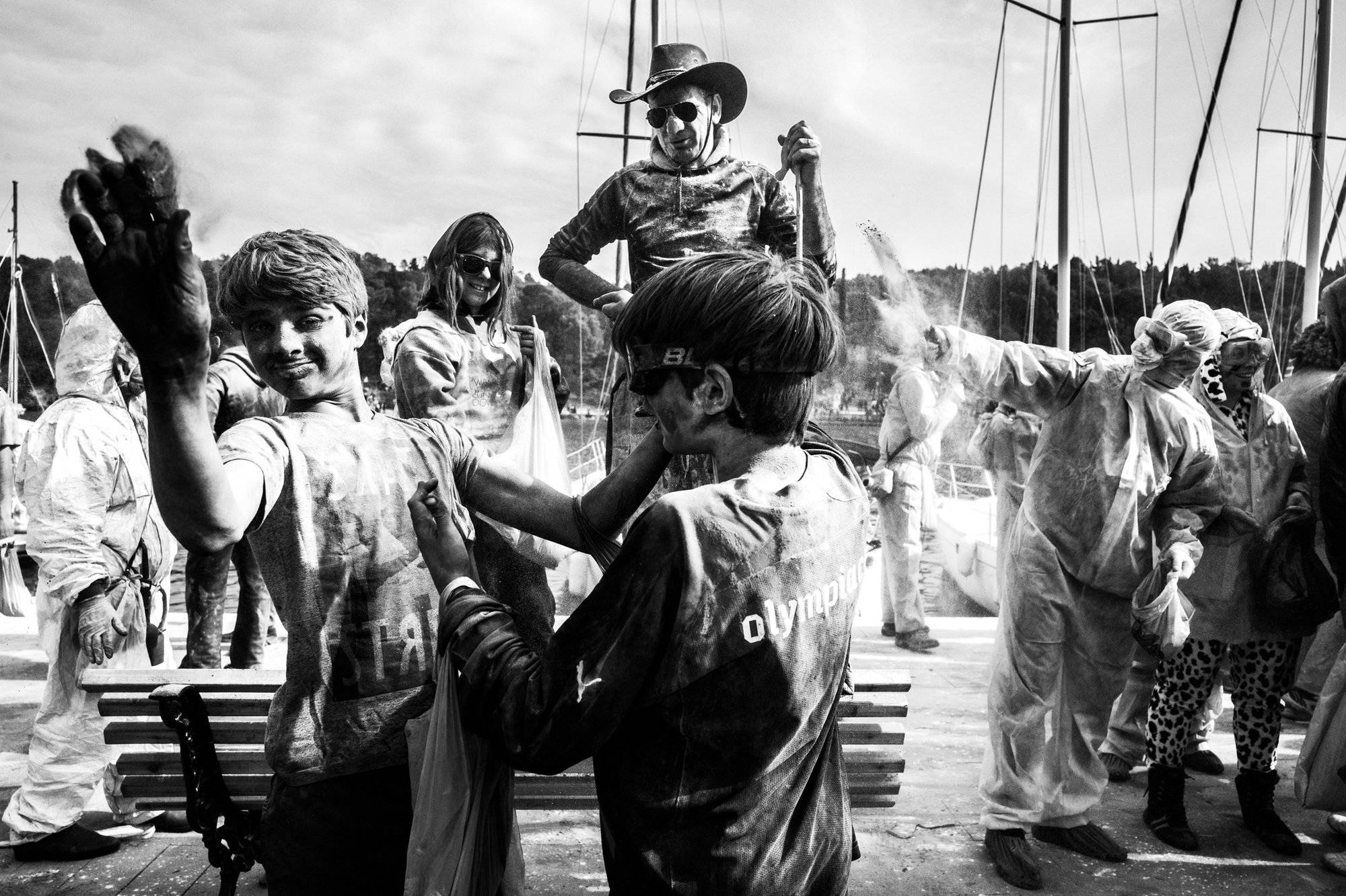 Having fun, and flour at the flour wars of Galaxidi, by photographer George Tatakis