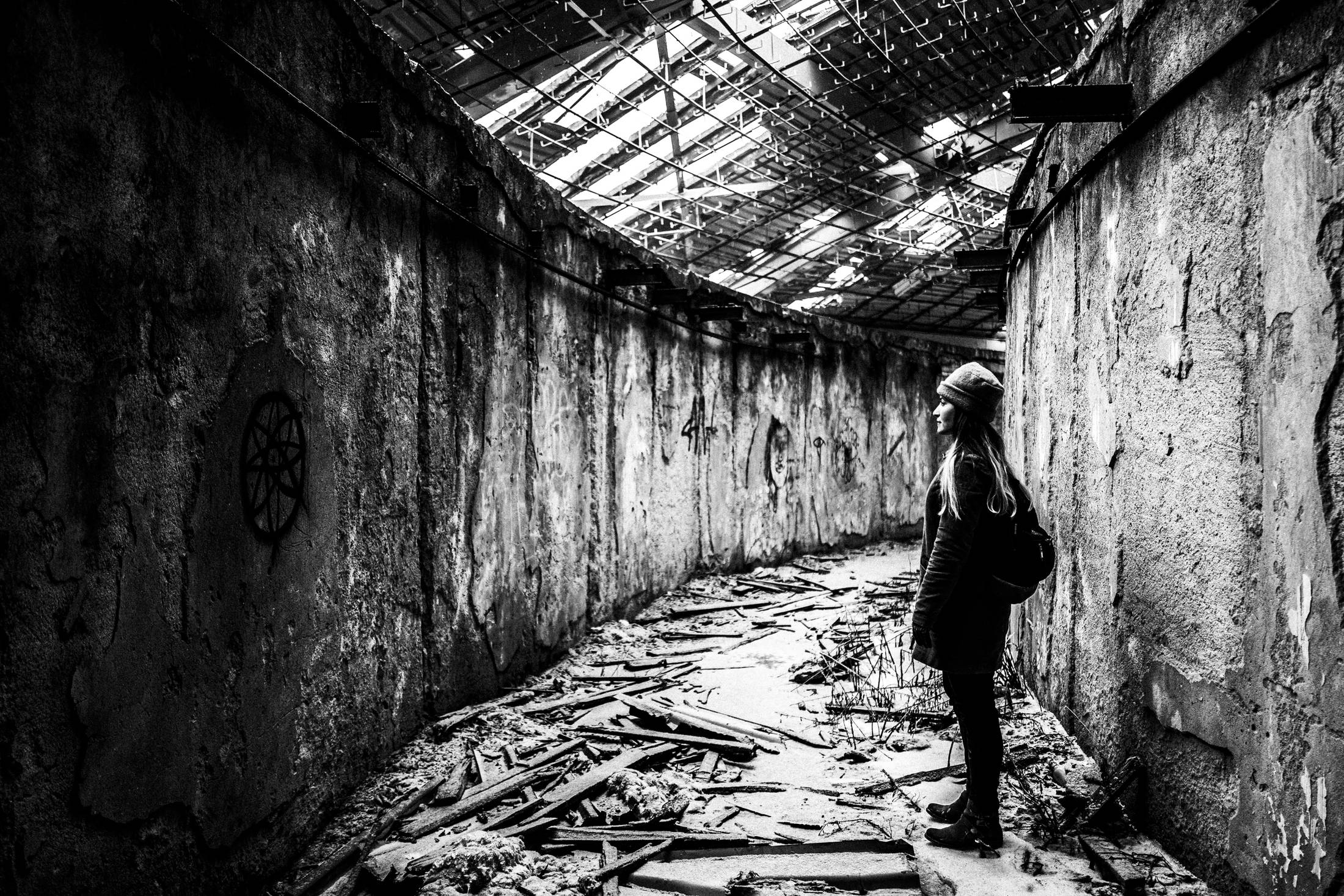 Eva at the corridors. Buzludzha, Bulgaria, by photographer George Tatakis