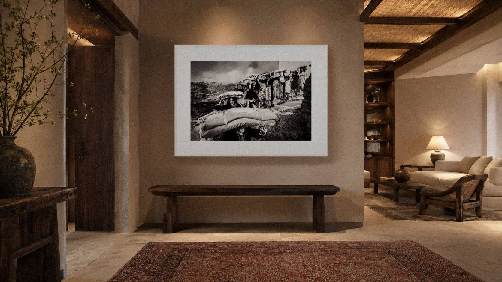 Large framed black-and-white fine-art photograph displayed in a warm luxury interior, illustrating museum-style presentation and long-term collectibility.
