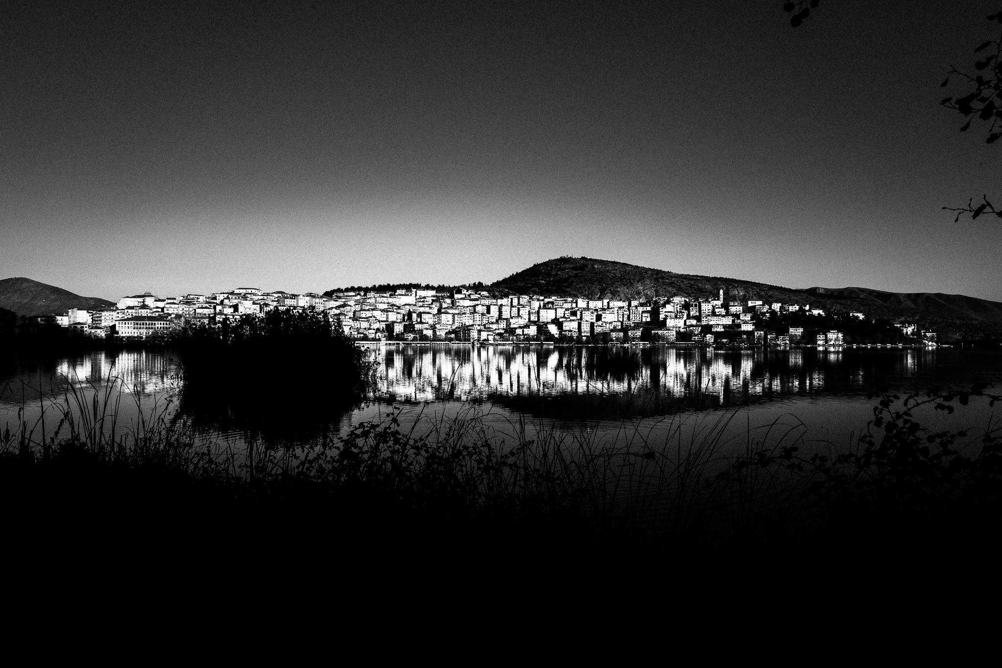 View of the city of Kastoria, Pagan Christmas customs of Northern Greece, by photographer George Tatakis