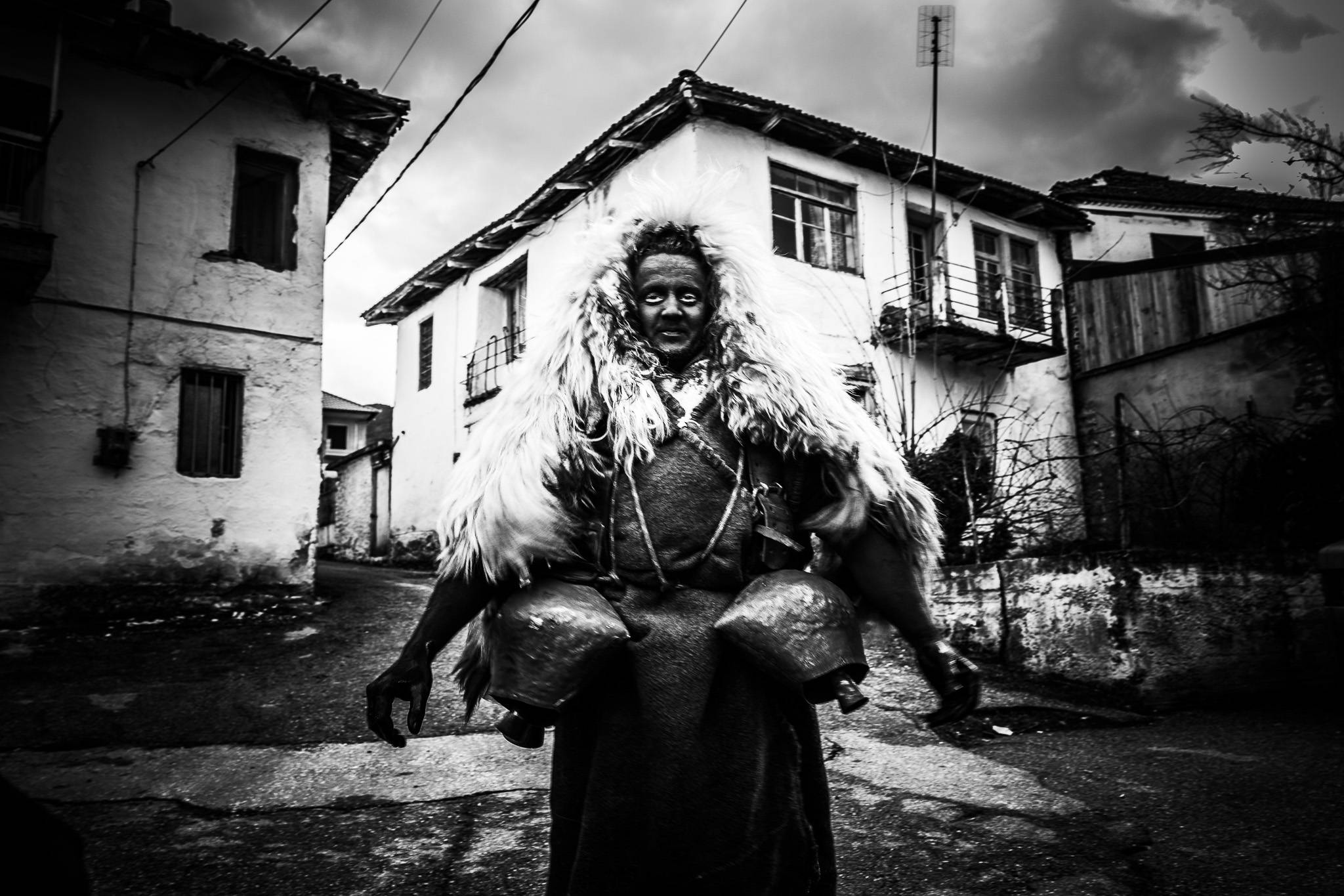 An Arapis is ready to perform the ritual custom, Pagan Christmas customs of Northern Greece, by photographer George Tatakis