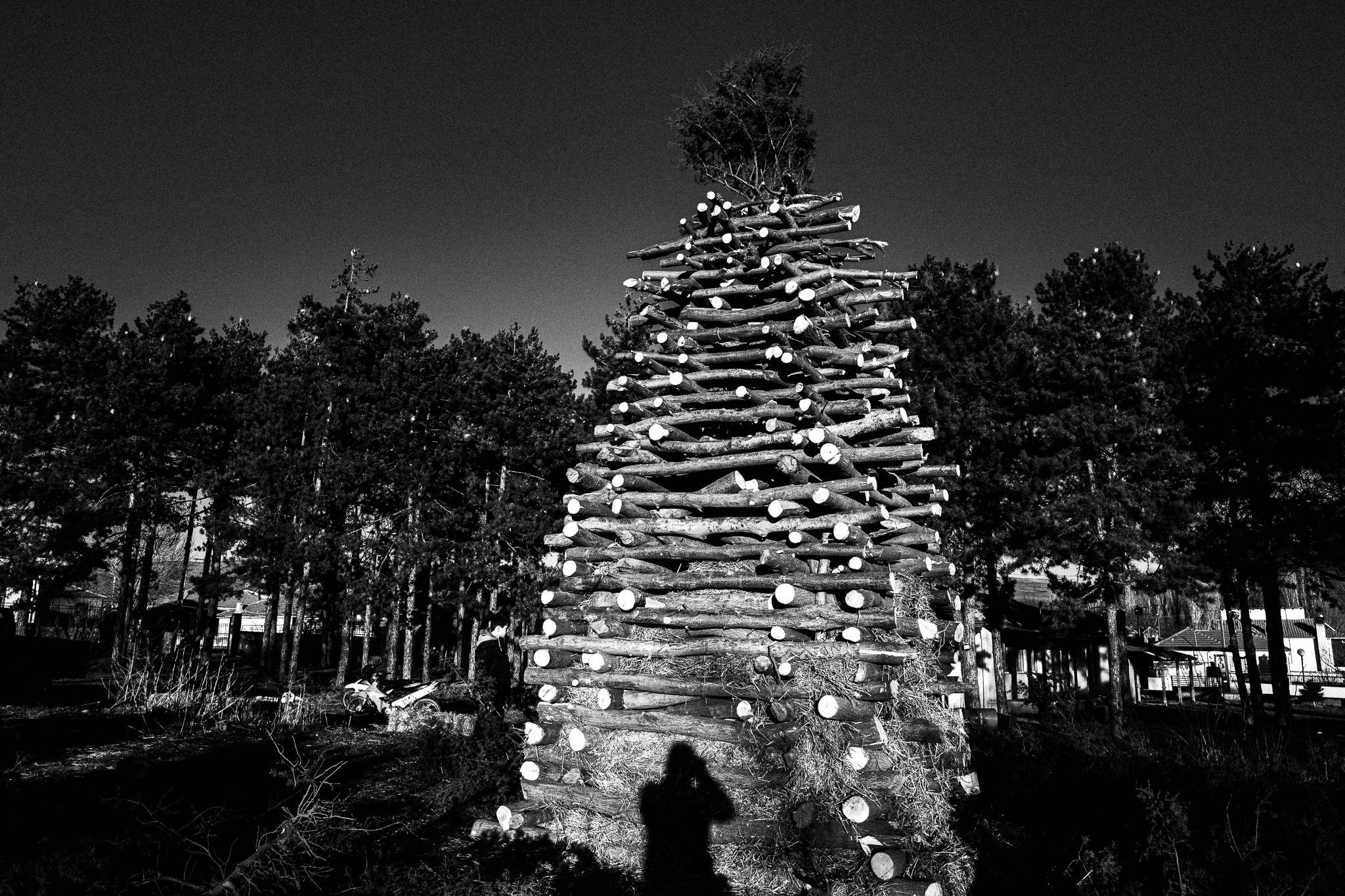 The pile of wood in Achlada for the bonfire, Pagan Christmas customs of Northern Greece, by photographer George Tatakis
