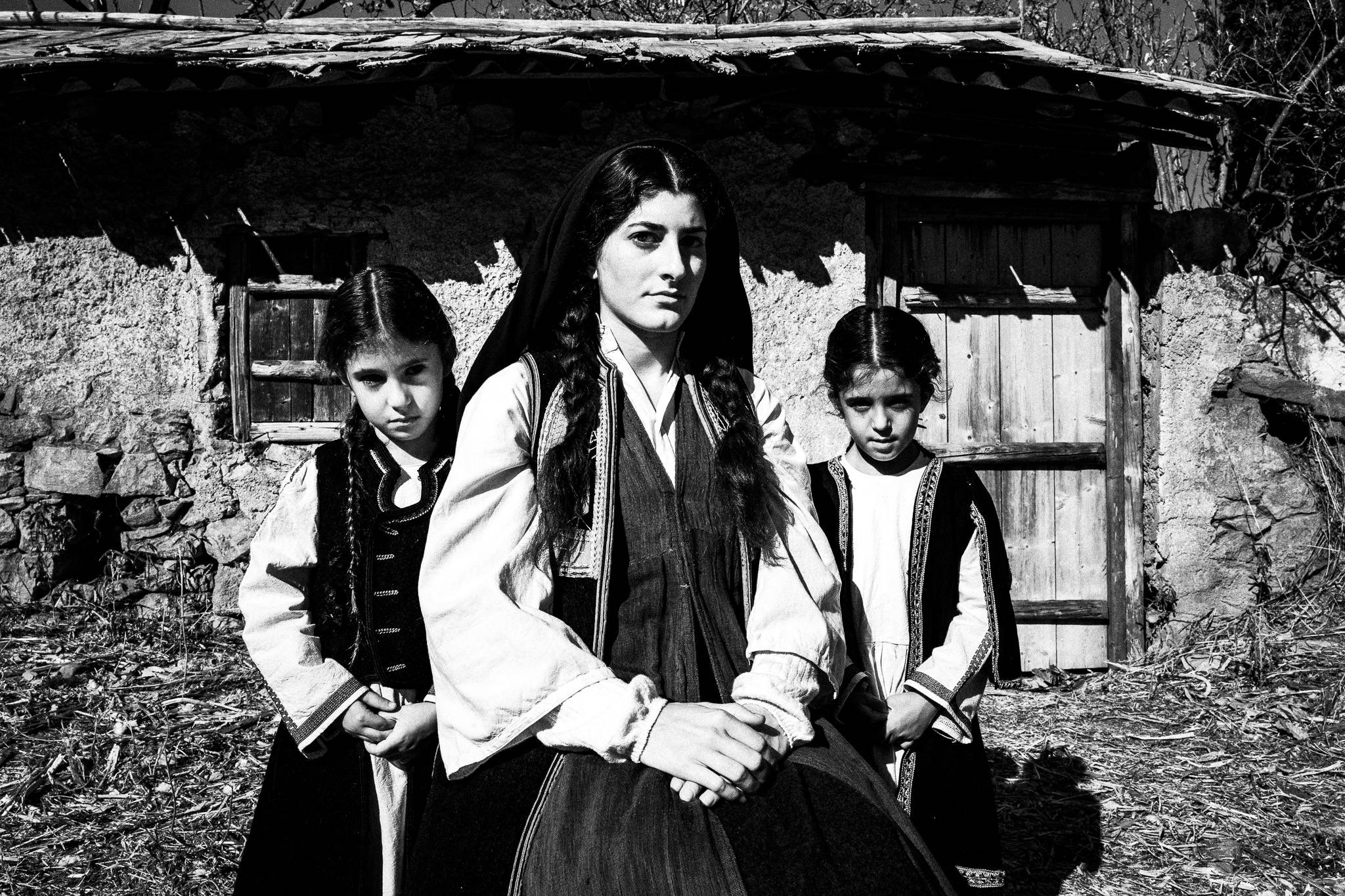 Mother and children. Black and white photography by George Tatakis during the filming of 'Φόνισσα'(Fonissa).