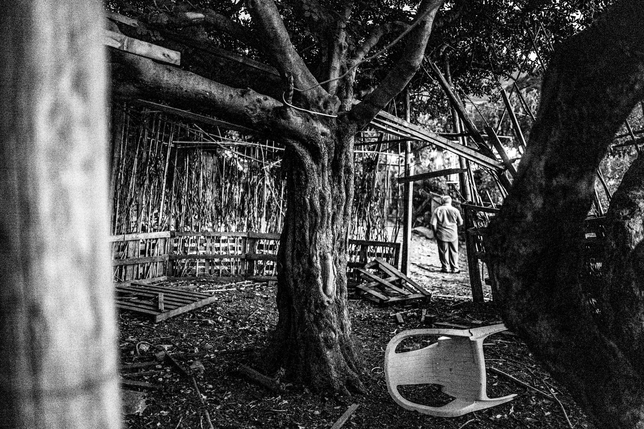 Inside a hut, during the festival of Panagia Charakiani, Rethymnon, Crete, by photographer George Tatakis