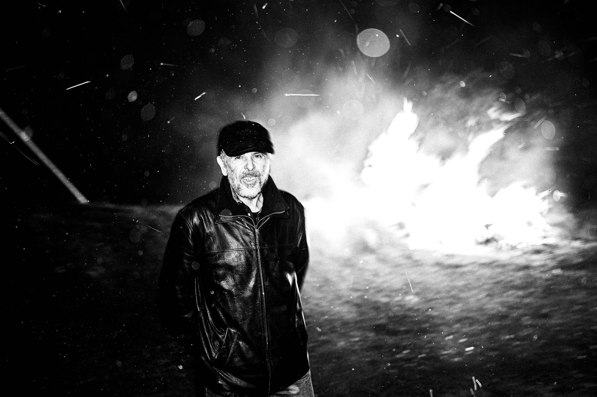 Enjoying the bonfire at Giourouki, Pagan Christmas customs of Northern Greece, by photographer George Tatakis
