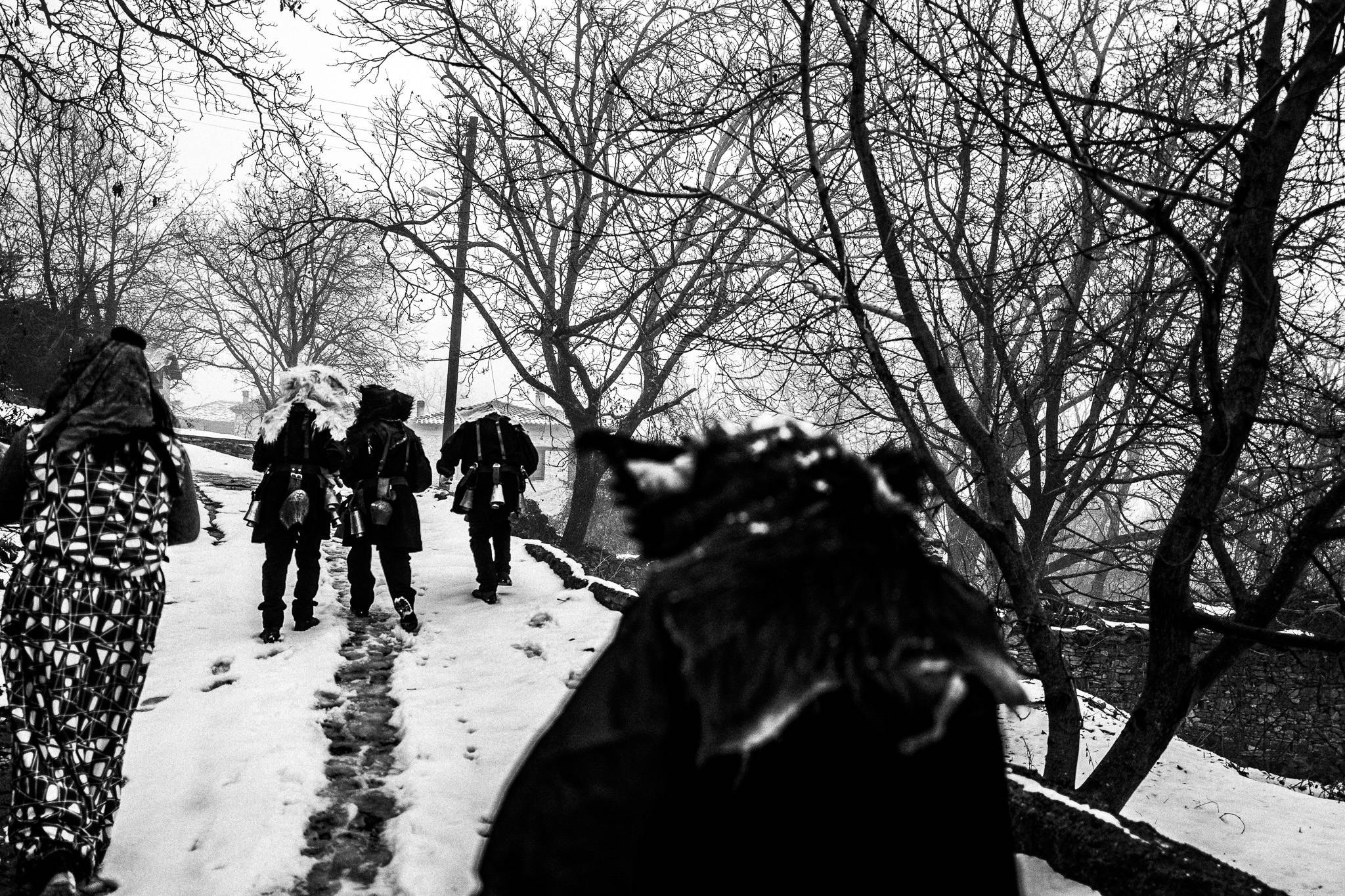 Charapides round the village, Pagan Christmas customs of Northern Greece, by photographer George Tatakis