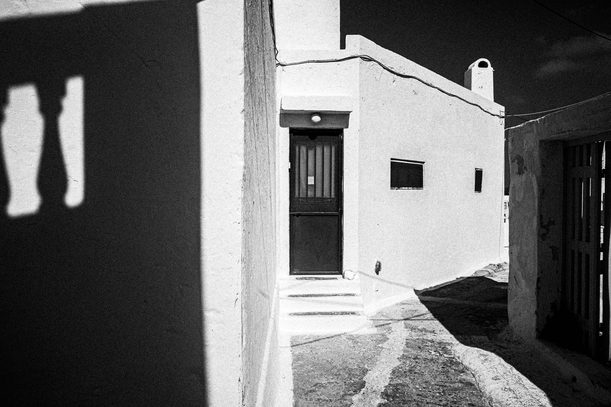 Chorōs on Santorini. Black and white photographic project from Greece, by awarded photographer George Tatakis