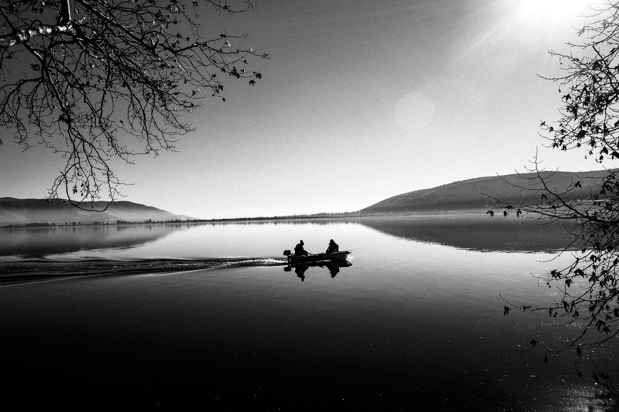 The lake of Kastoria, Pagan Christmas customs of Northern Greece, by photographer George Tatakis