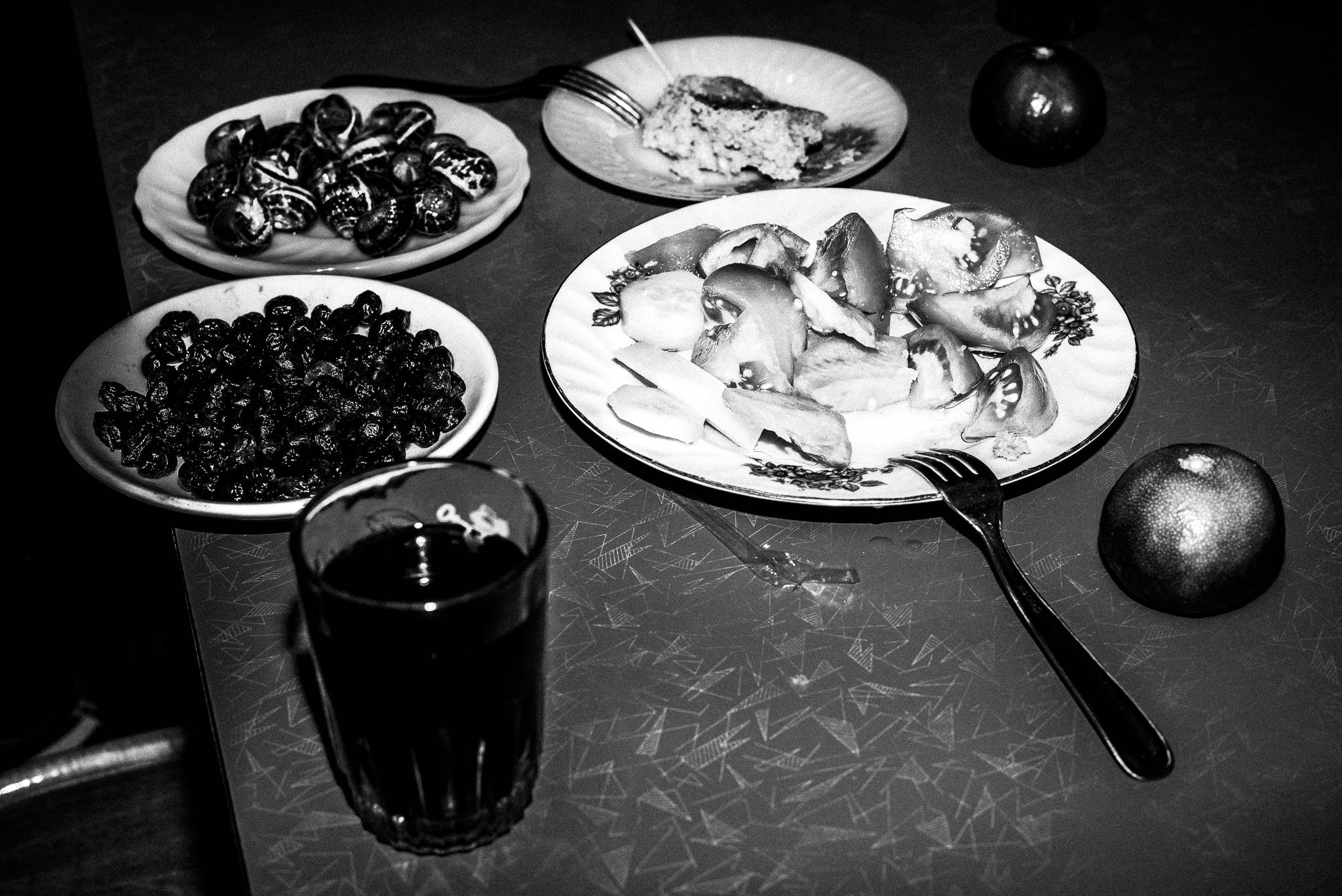 Food at café Crete in Olympos, Karpathos, Greece. Black and white photography by George Tatakis 