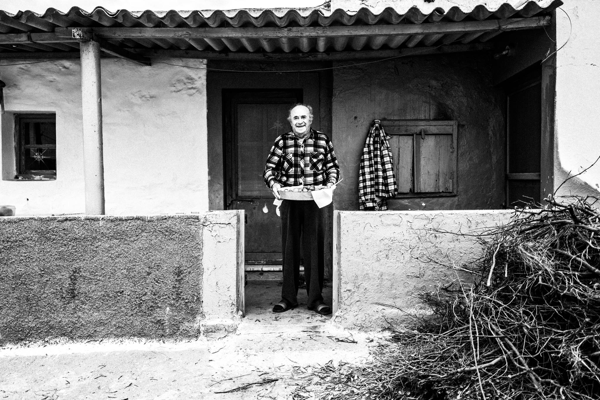 Preparing traditional pies in Patmos, by photographer George Tatakis