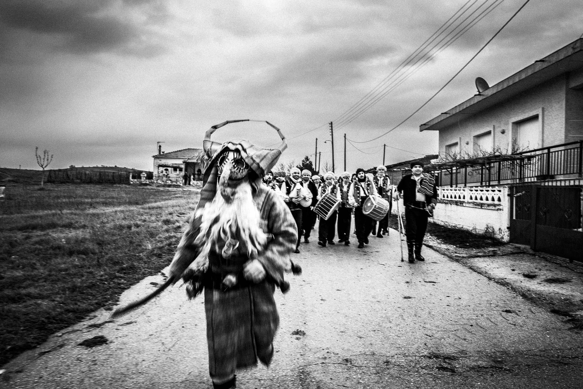 Purpuris running around, Pagan Christmas customs of Northern Greece, by photographer George Tatakis