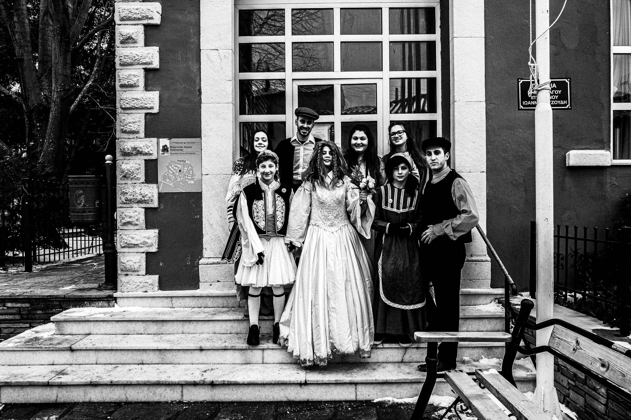 A group photograph, Pagan Christmas customs of Northern Greece, by photographer George Tatakis