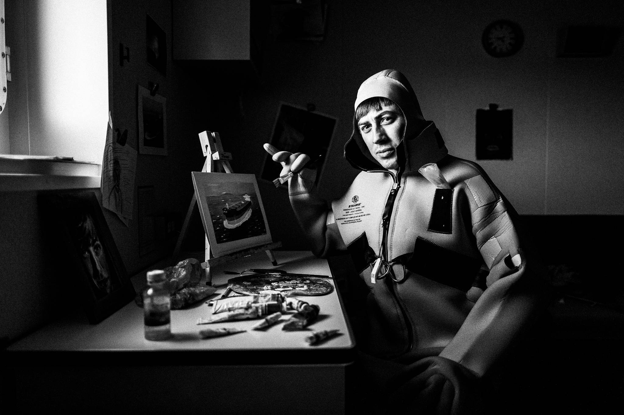 Anthony in his cabin wearing the immersion suit by photographer George Tatakis