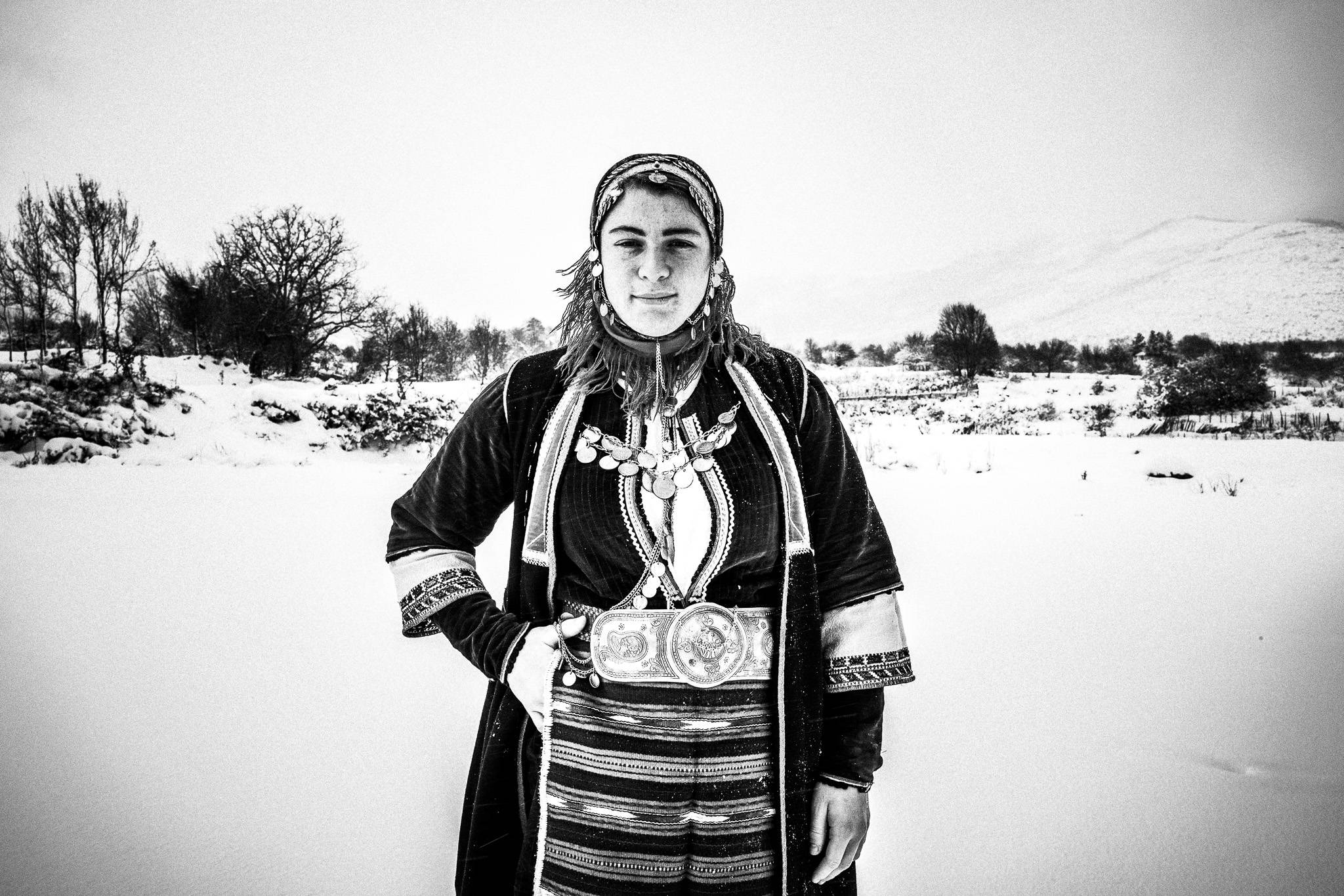 The traditional female costume of Volax, Drama, Pagan Christmas customs of Northern Greece, by photographer George Tatakis