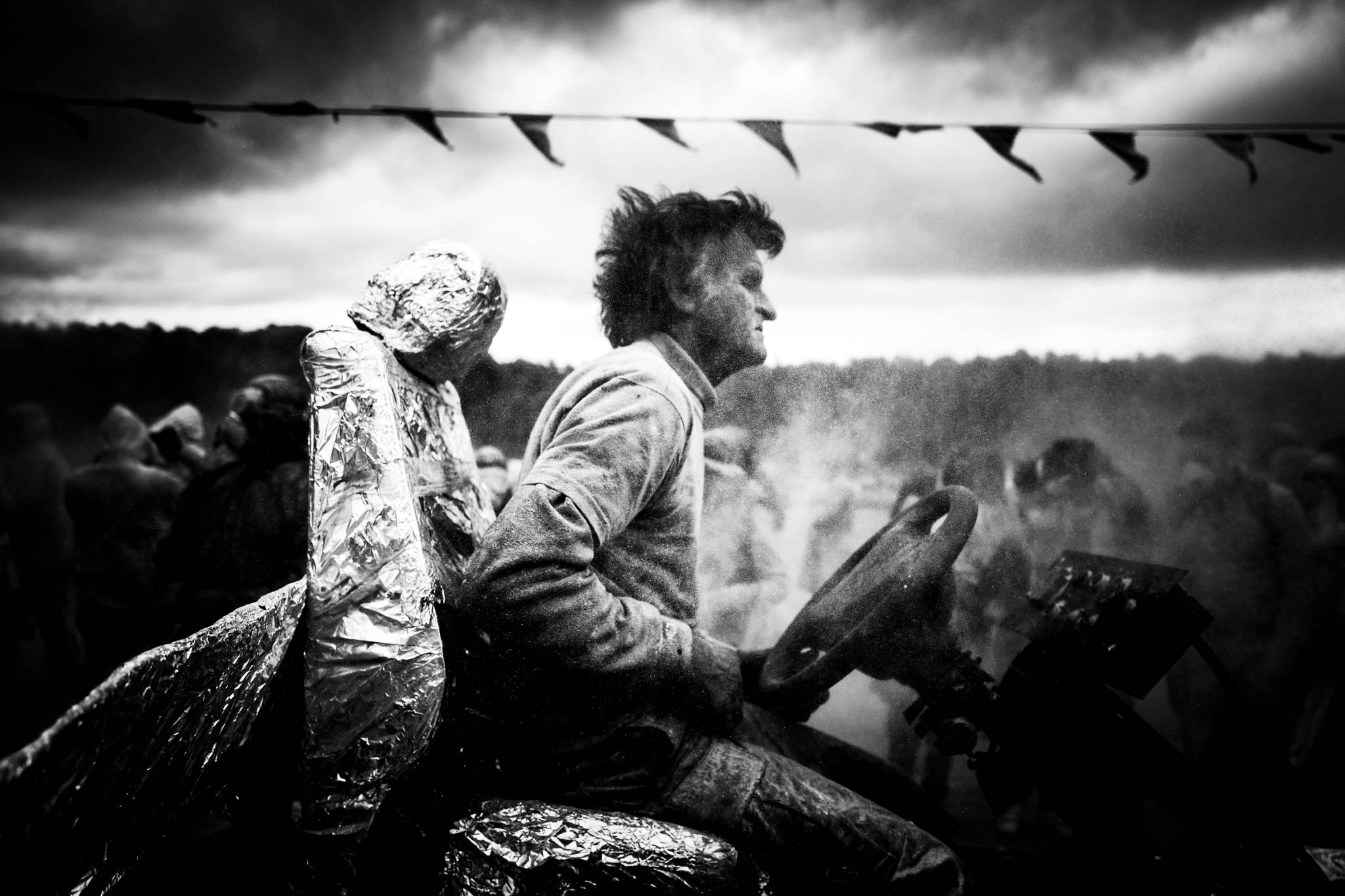 Operating a vehicle at the flour wars in Galaxidi, by photographer George Tatakis