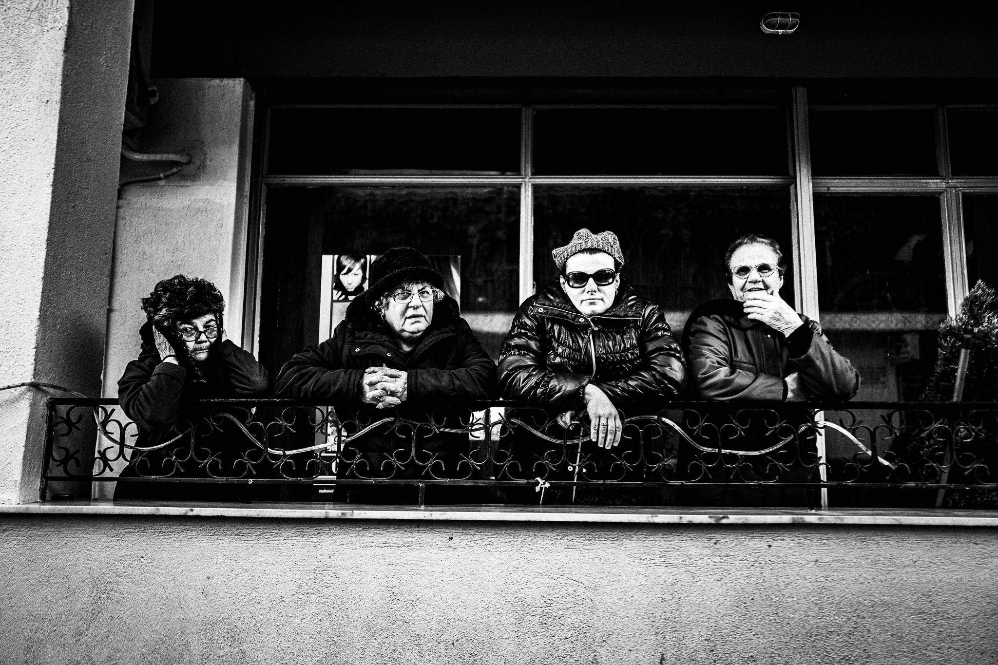 Onlookers at Monastiraki, Pagan Christmas customs of Northern Greece, by photographer George Tatakis